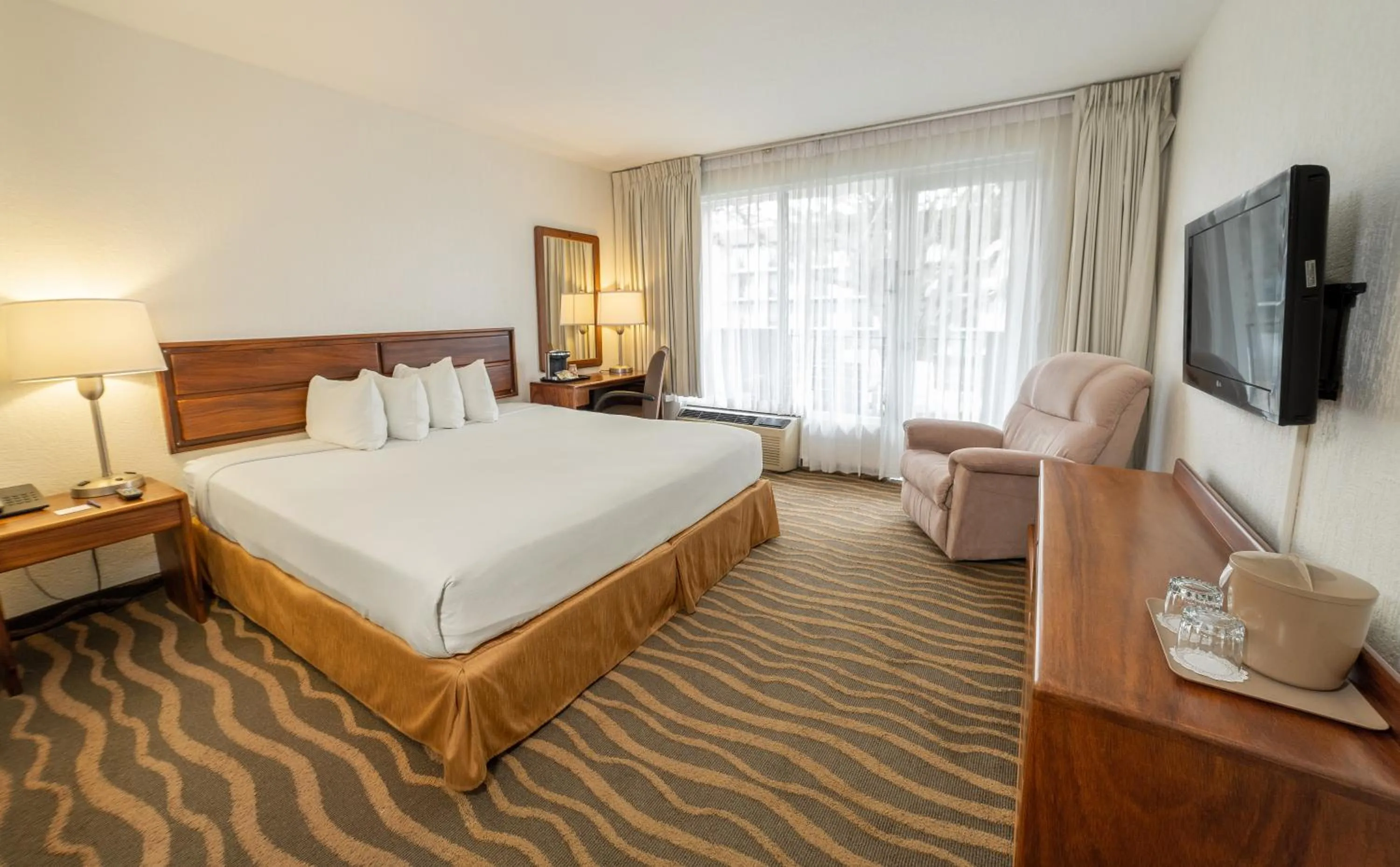 Bedroom, Bed in Irazú Hotel & Studios