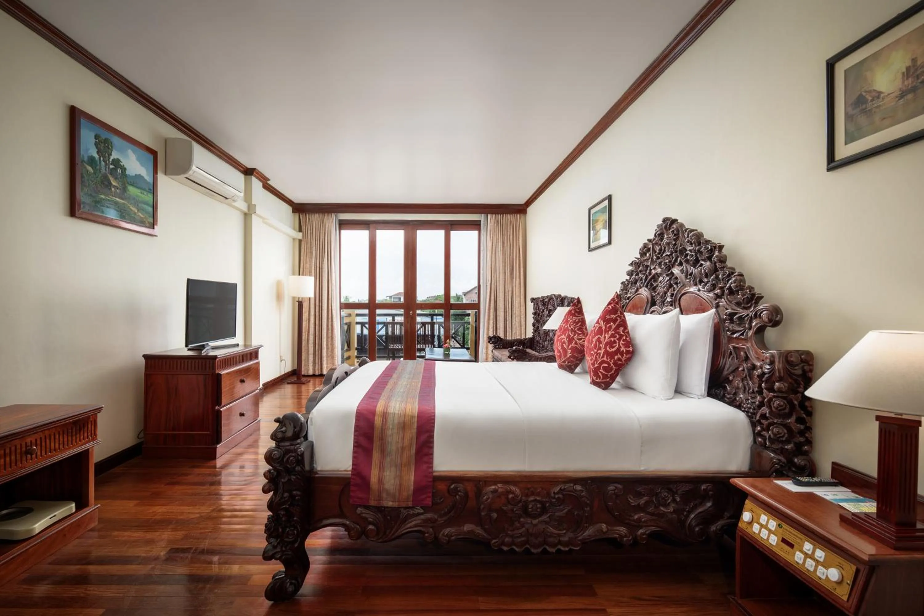 Photo of the whole room, Bed in Angkor Paradise Hotel