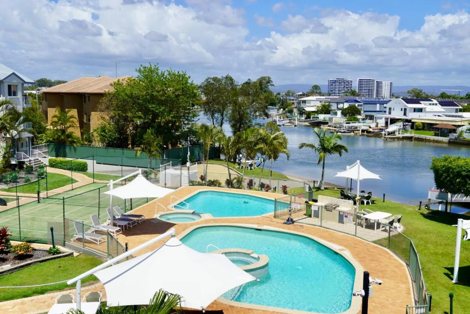 Swimming pool in Pelican Cove Waterfront Apartment
