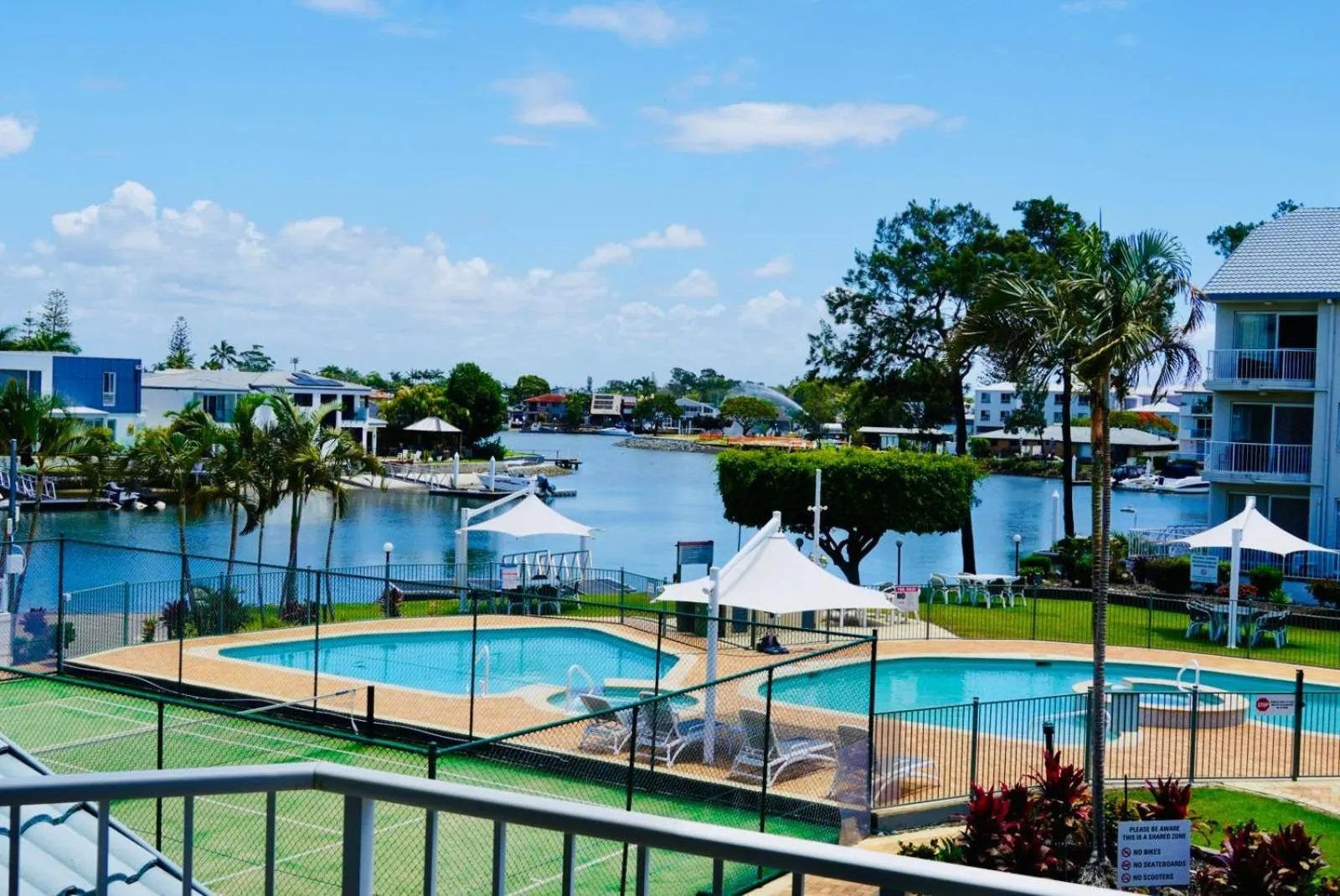 Swimming pool in Pelican Cove Waterfront Apartment