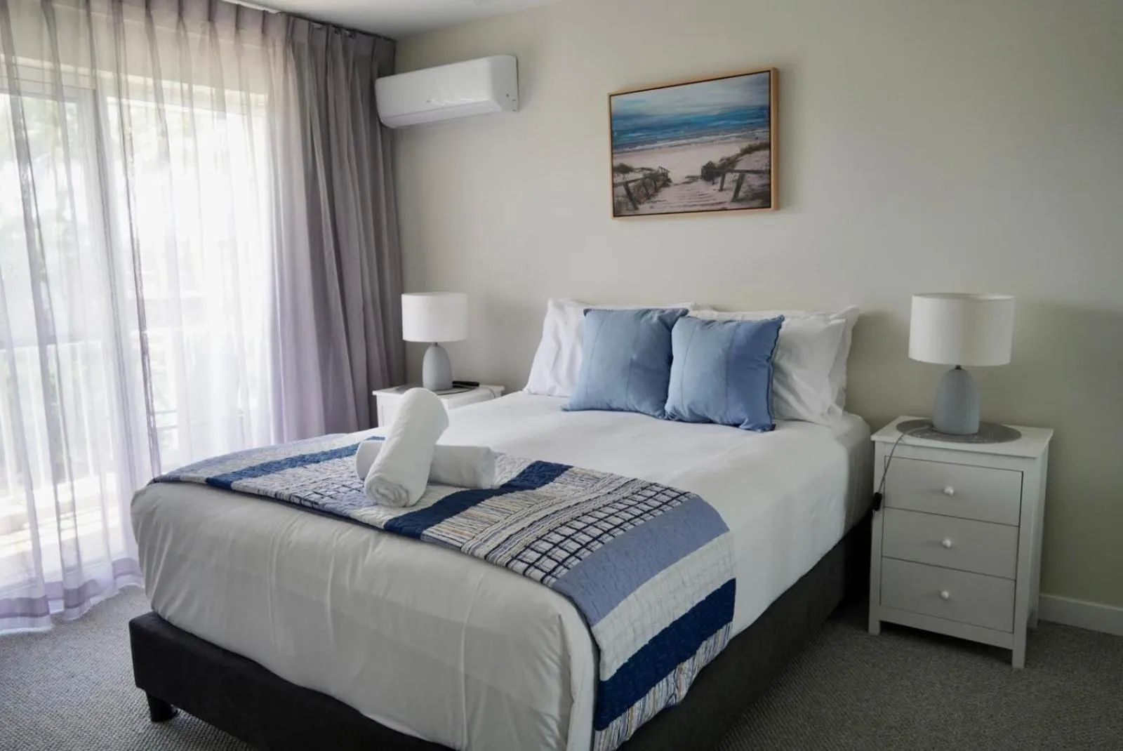 Bed in Pelican Cove Waterfront Apartment