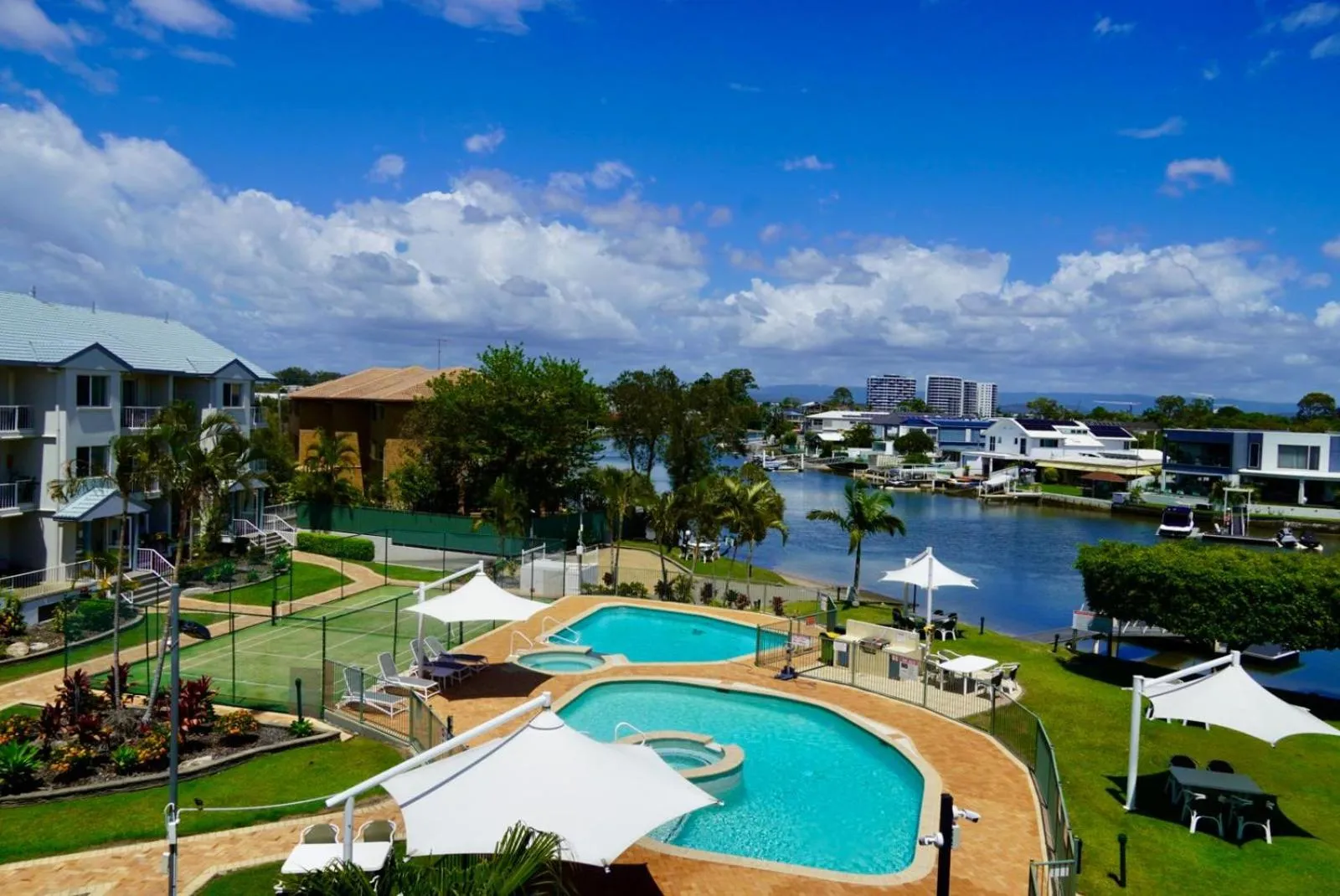 Swimming pool in Pelican Cove Waterfront Apartment