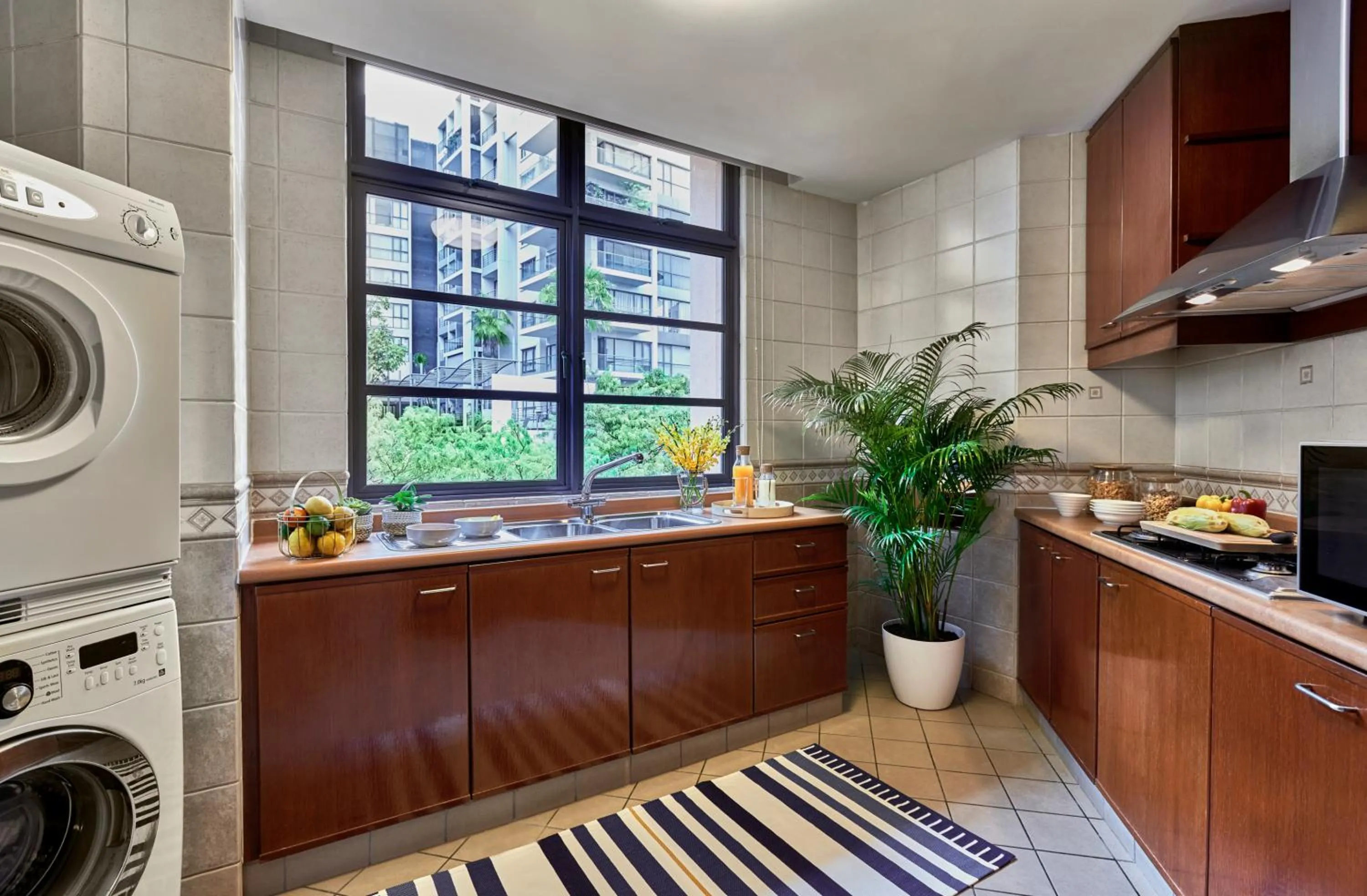 kitchen in Village Residence Robertson Quay by Far East Hospitality