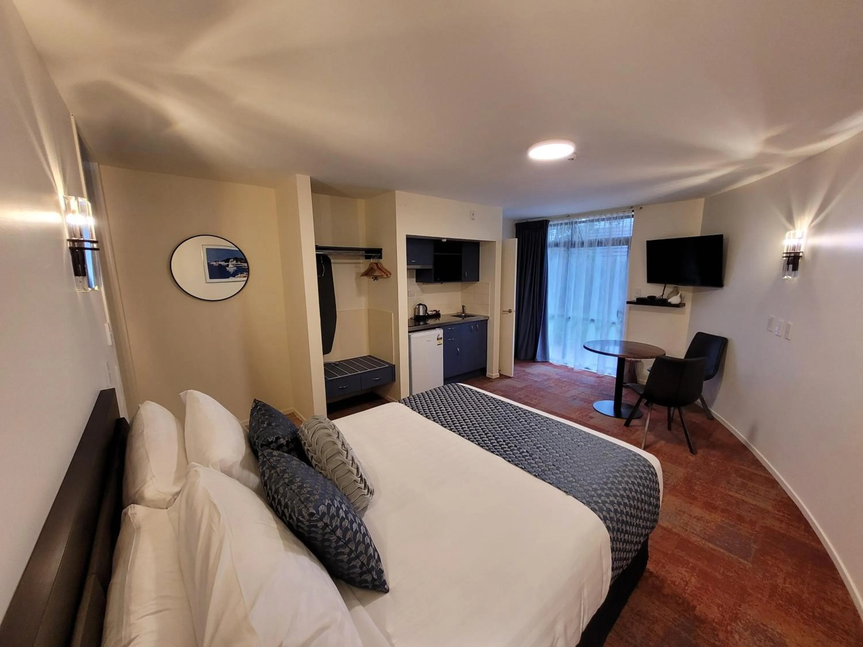 Bed in City of Sails Motel