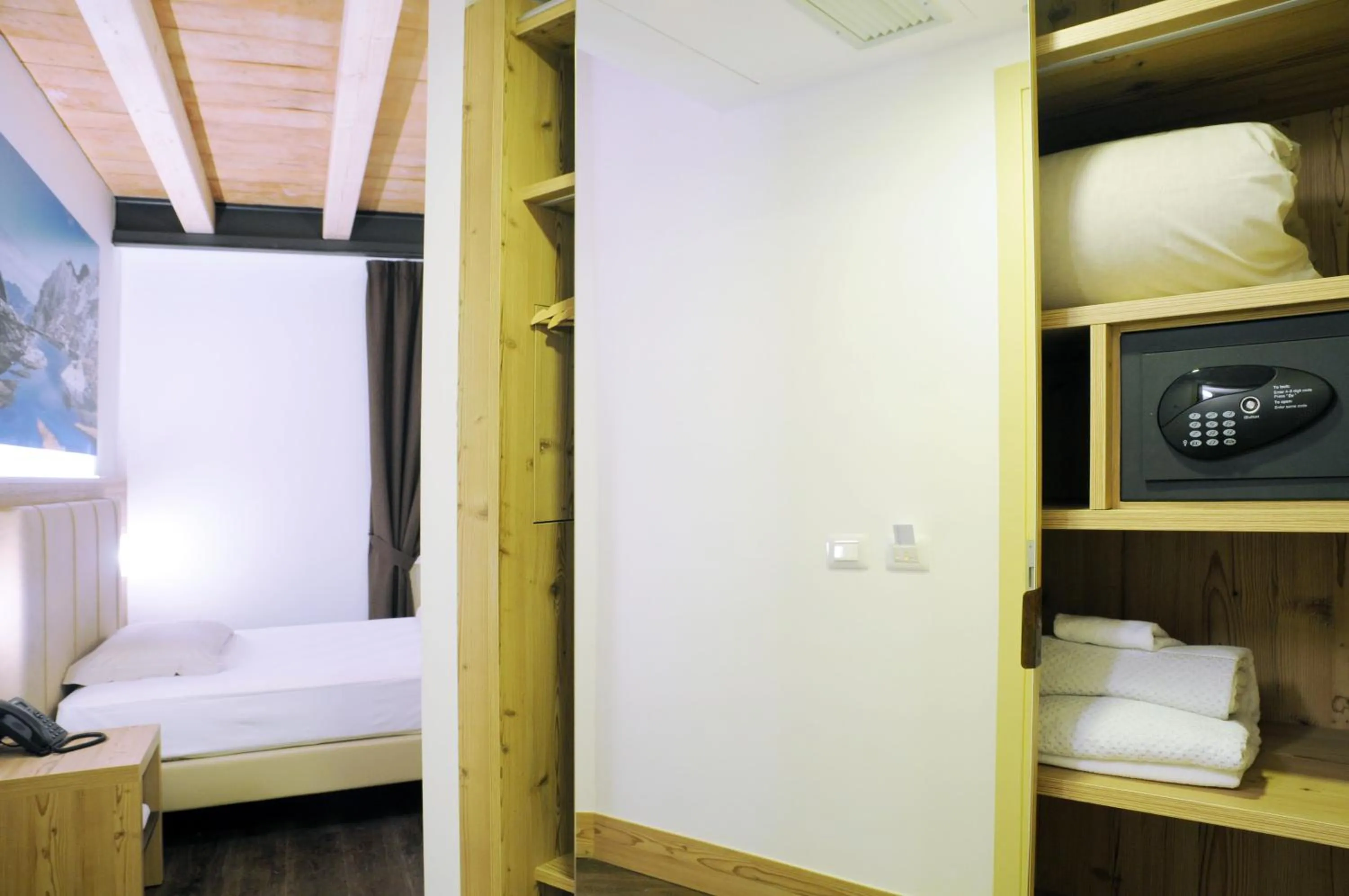 Bed in TOURING HOTEL & SPA