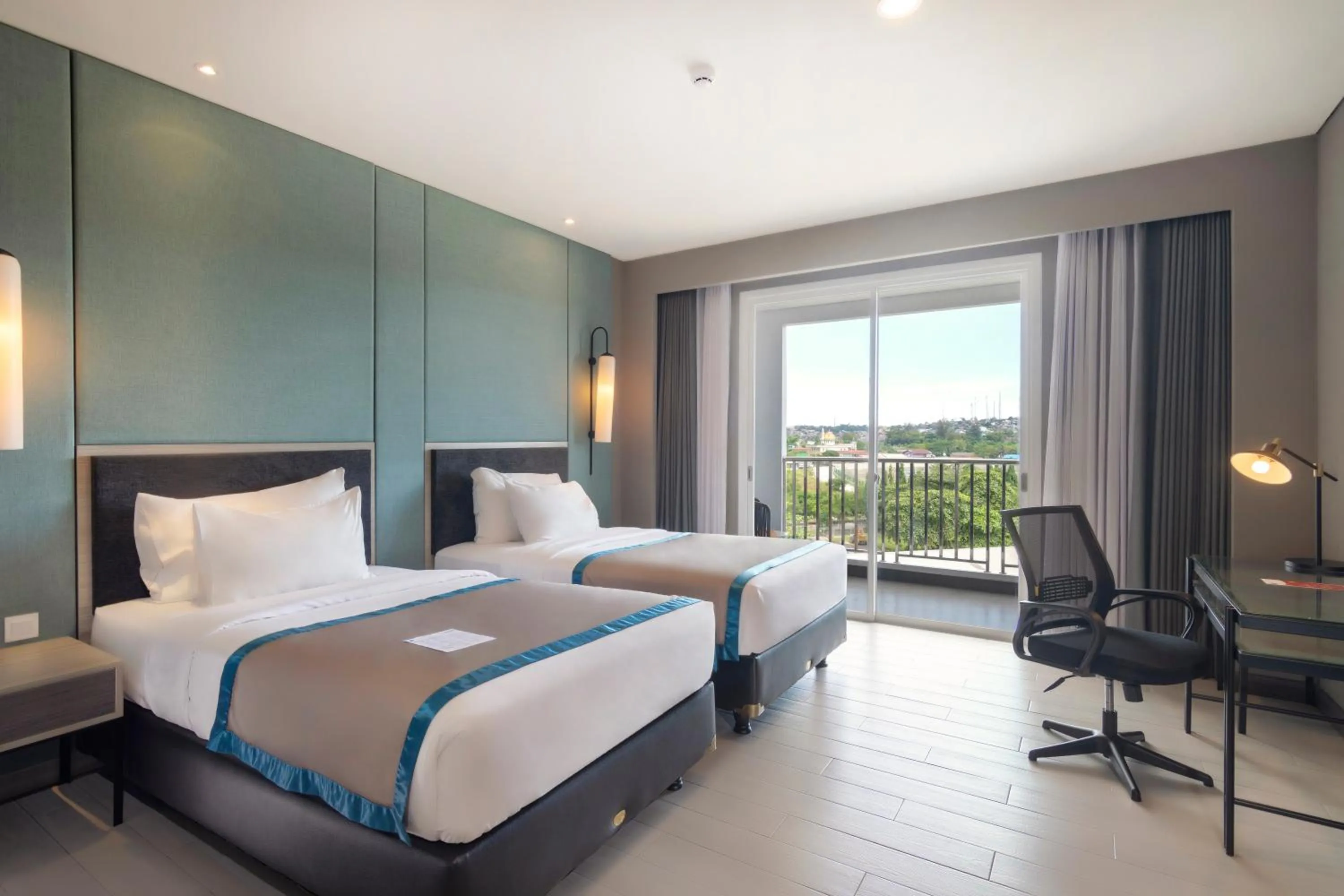 Bed in Blue Sky Hotel Balikpapan