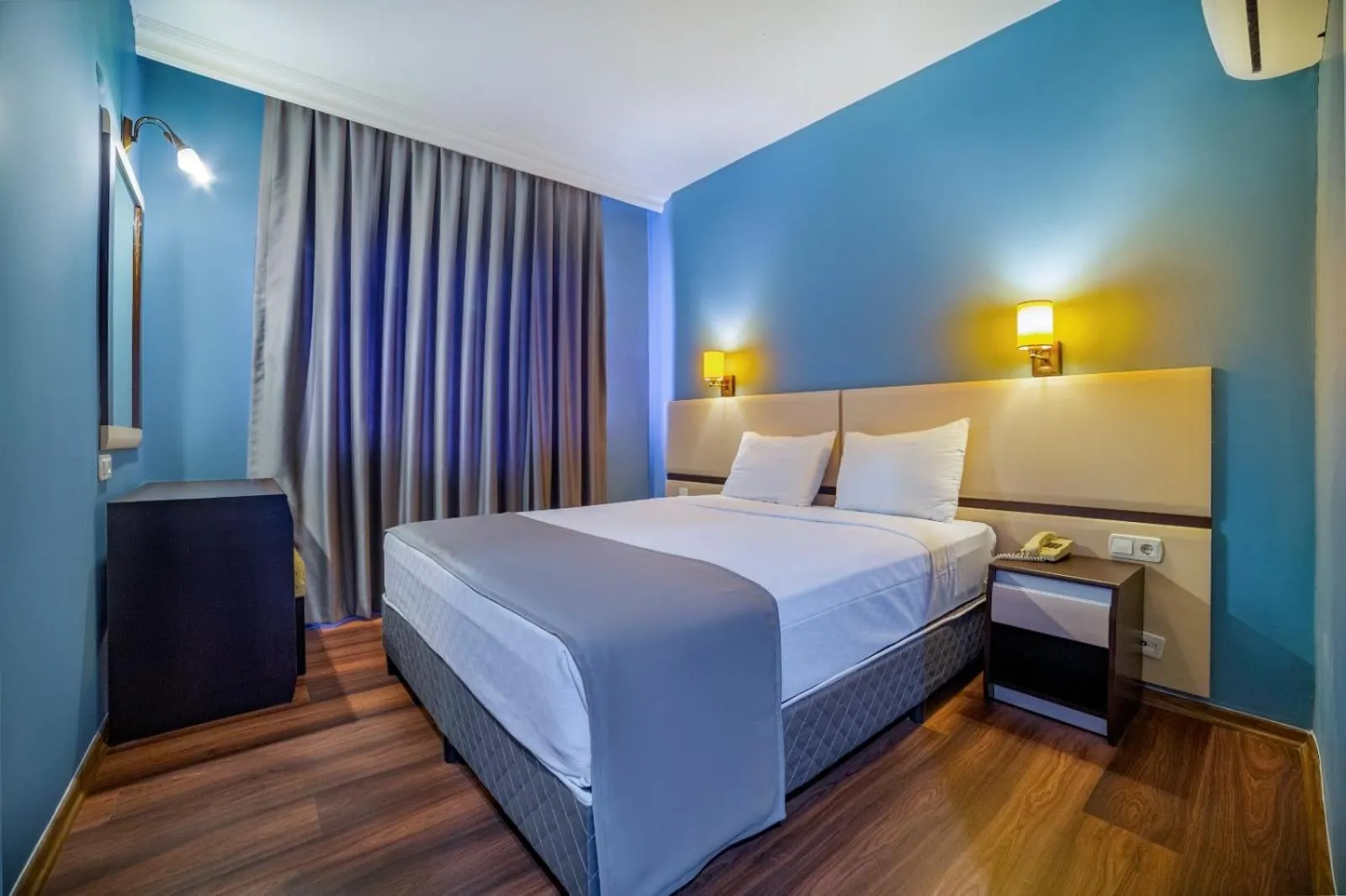 Bed in Royalisa City Apart Hotel