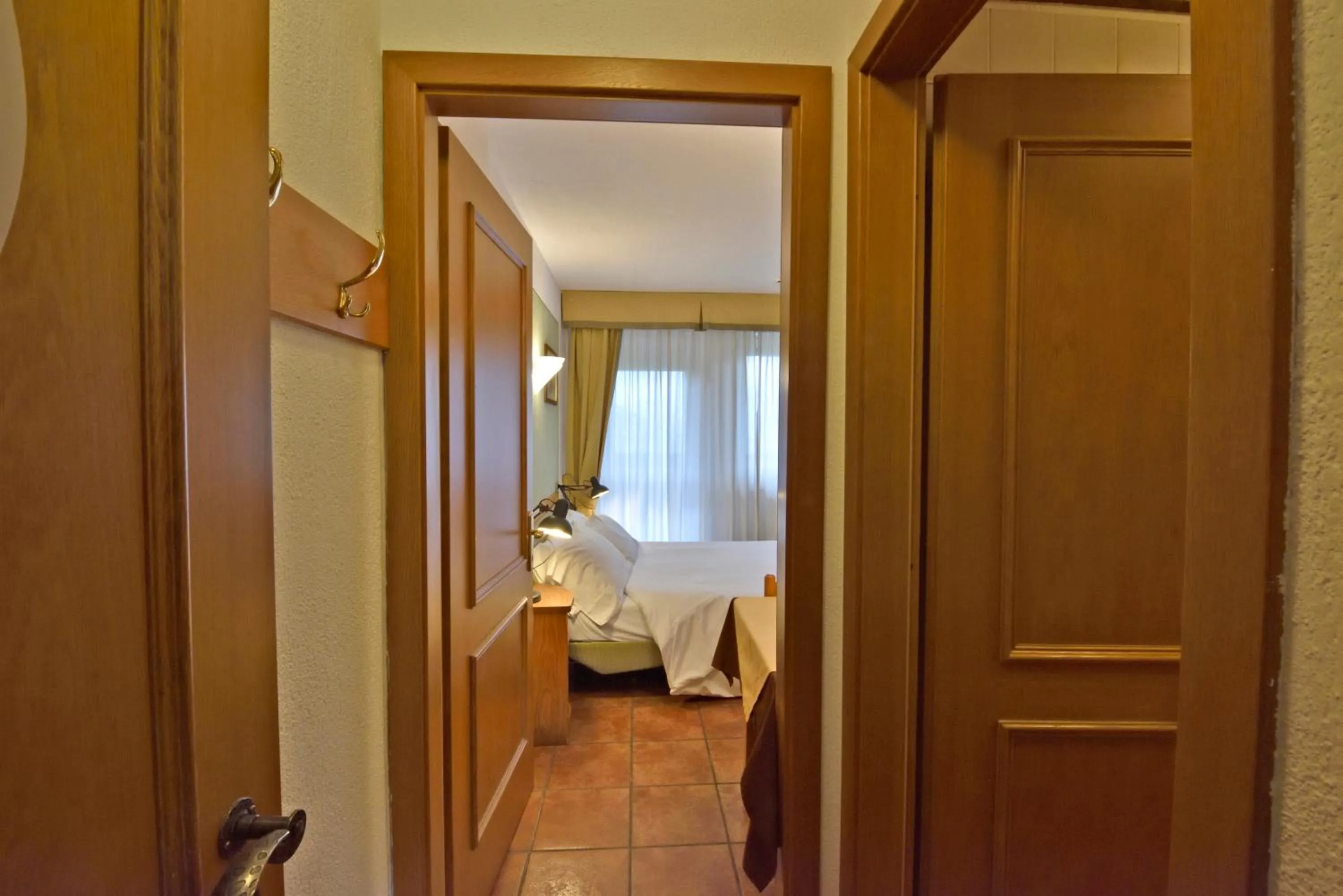 Bed in La Roche Hotel Appartments