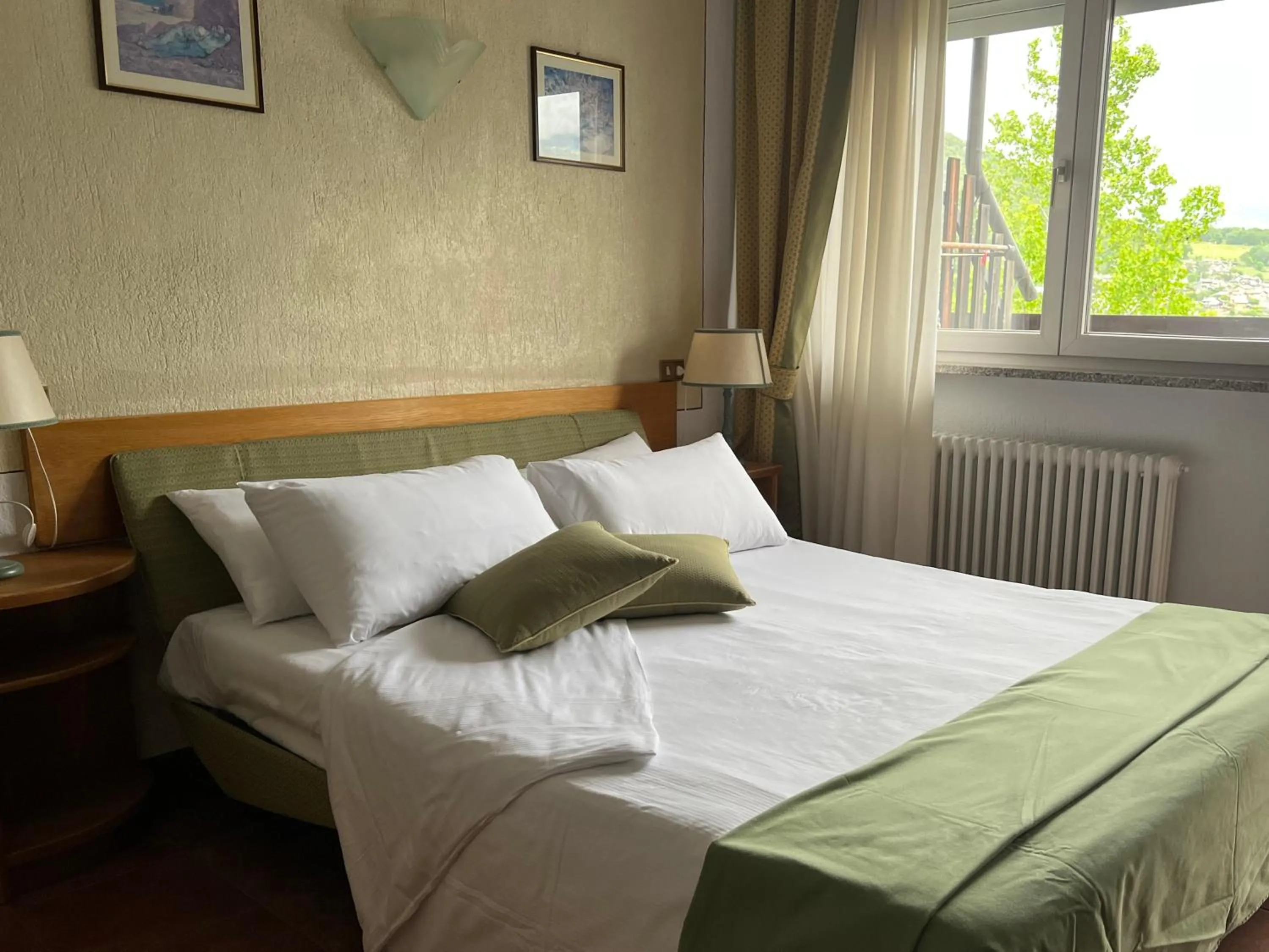 Bed in La Roche Hotel Appartments