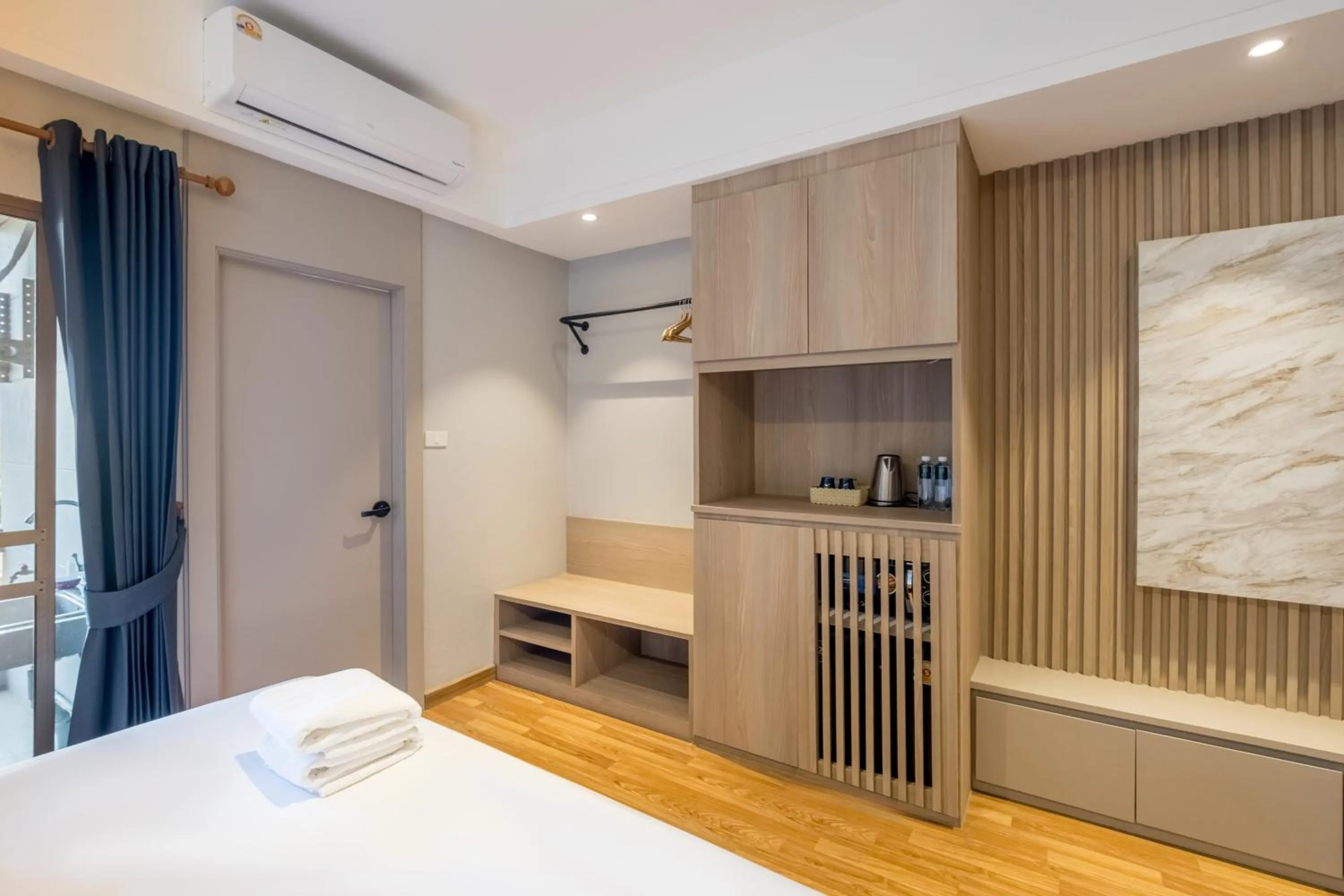 Kitchen or kitchenette, Bed in Boss Hotel