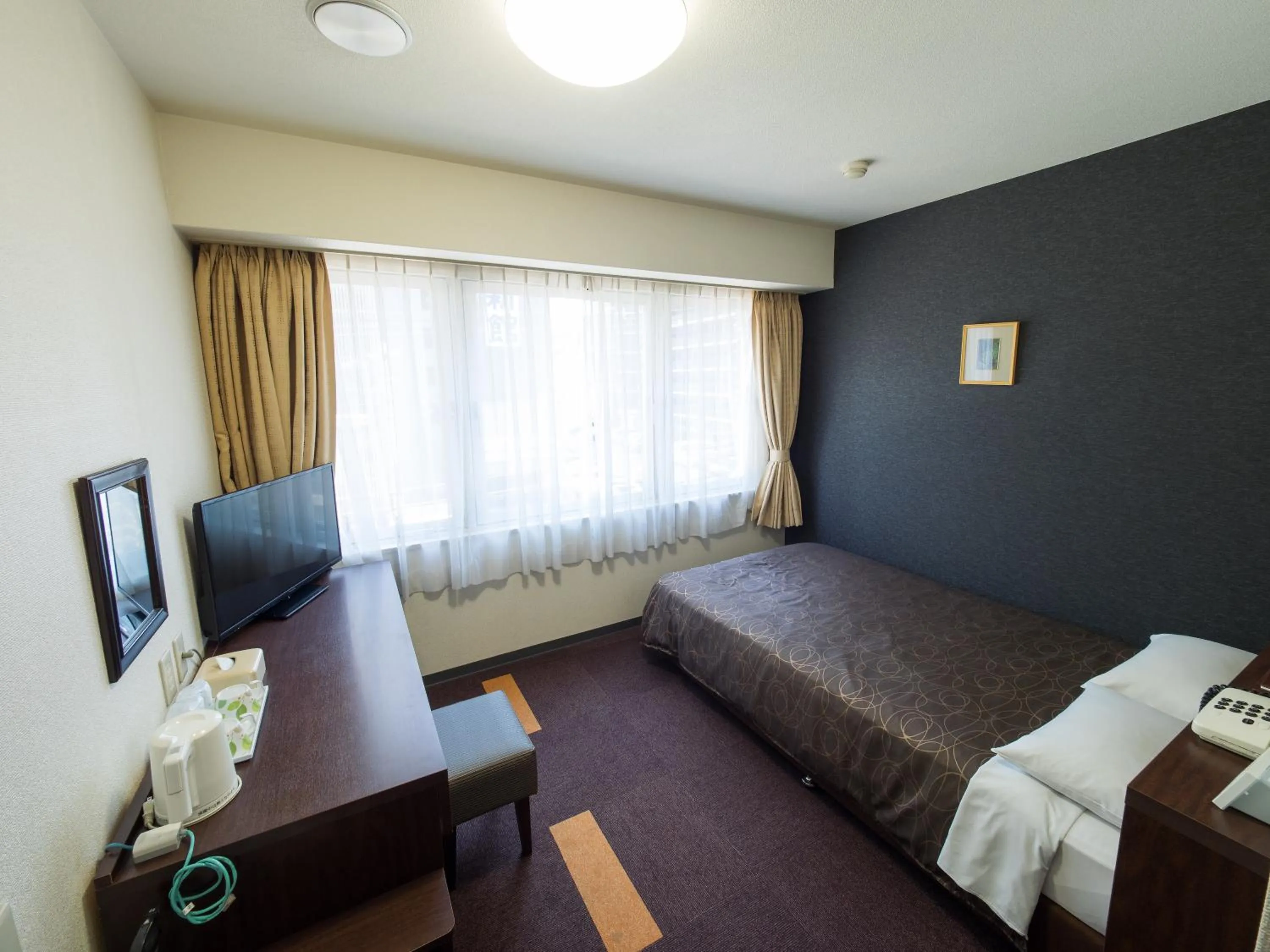 Photo of the whole room, Bed in Hotel Shin Osaka