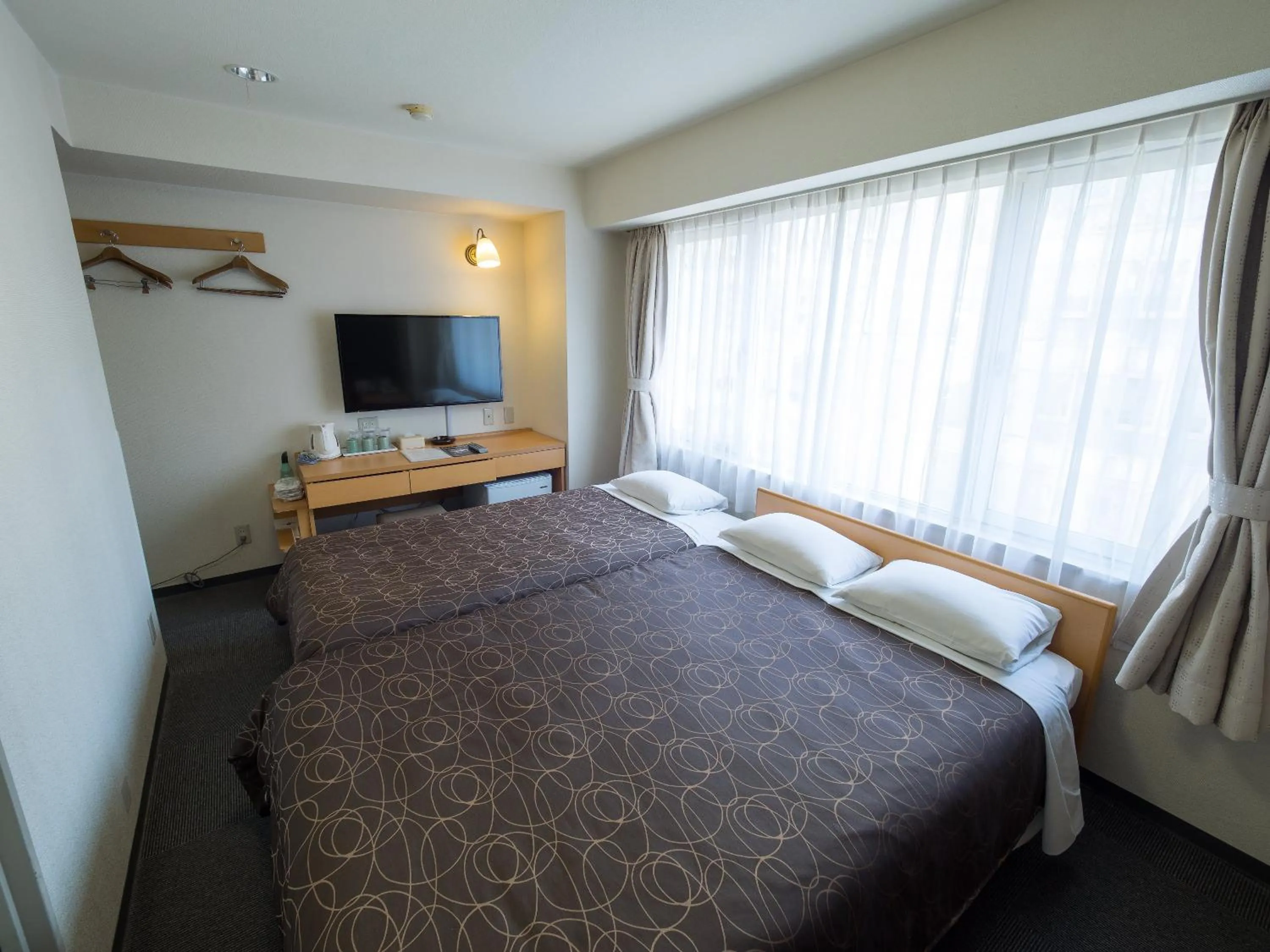 Photo of the whole room, Bed in Hotel Shin Osaka