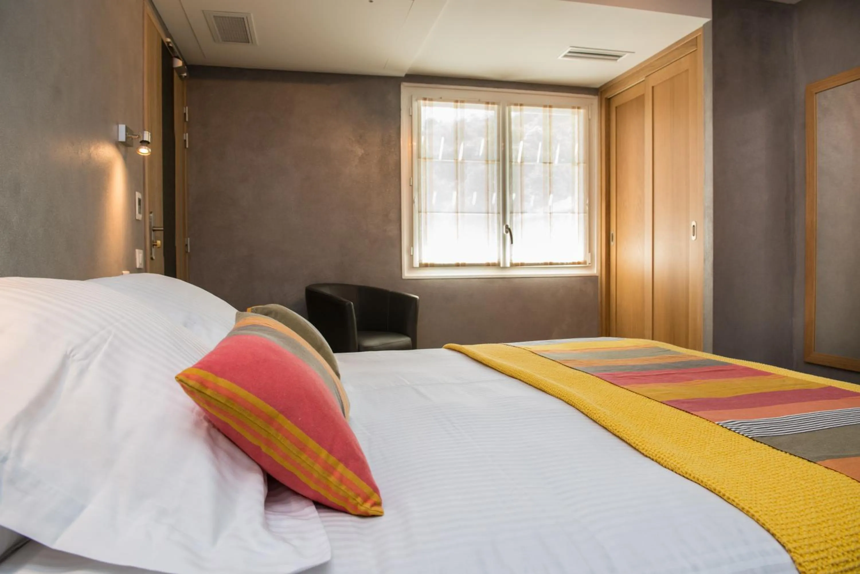 Photo of the whole room, Bed in Logis Hotel Ur-Hegian