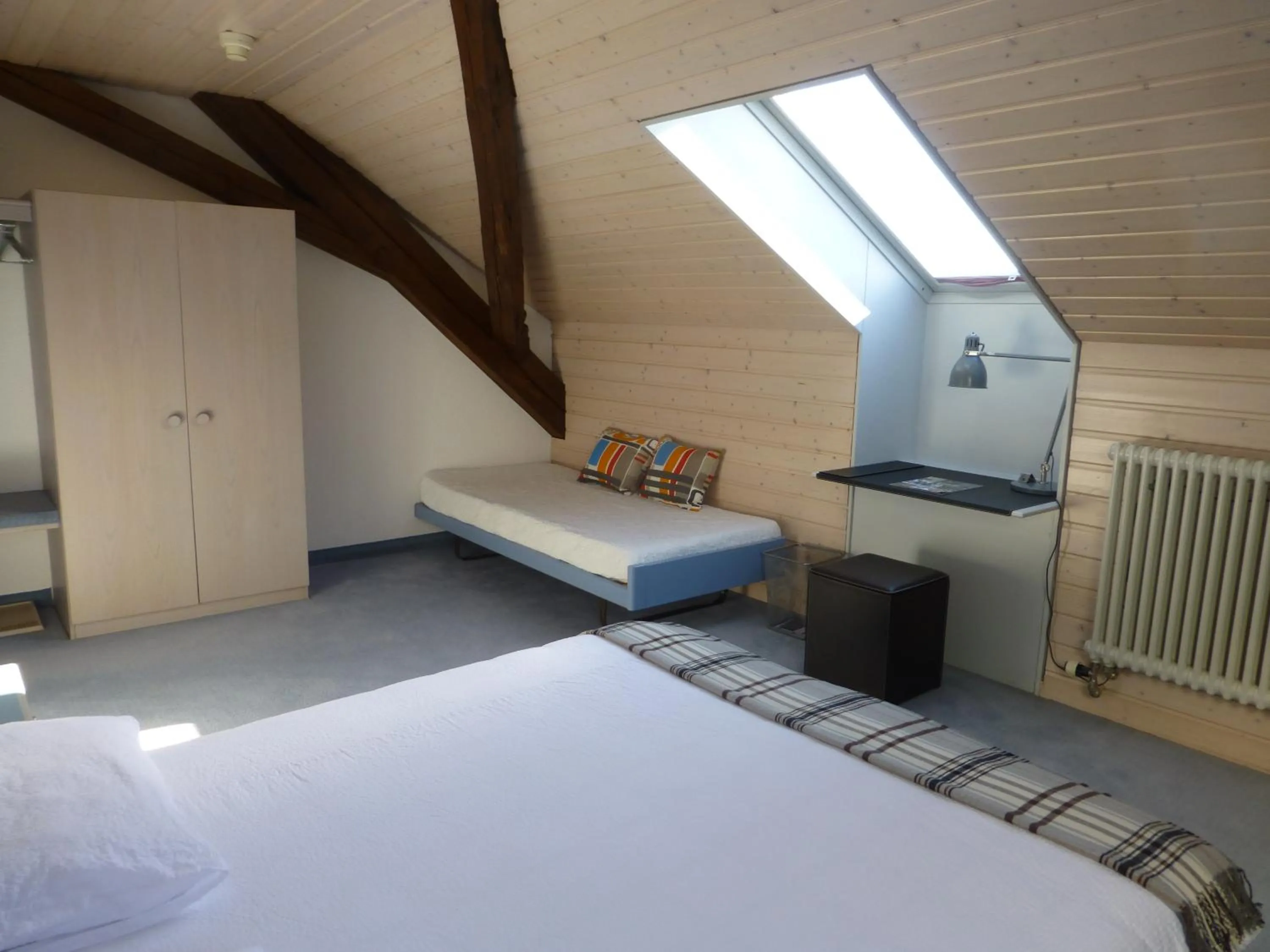 Photo of the whole room, Bed in Hôtel de France