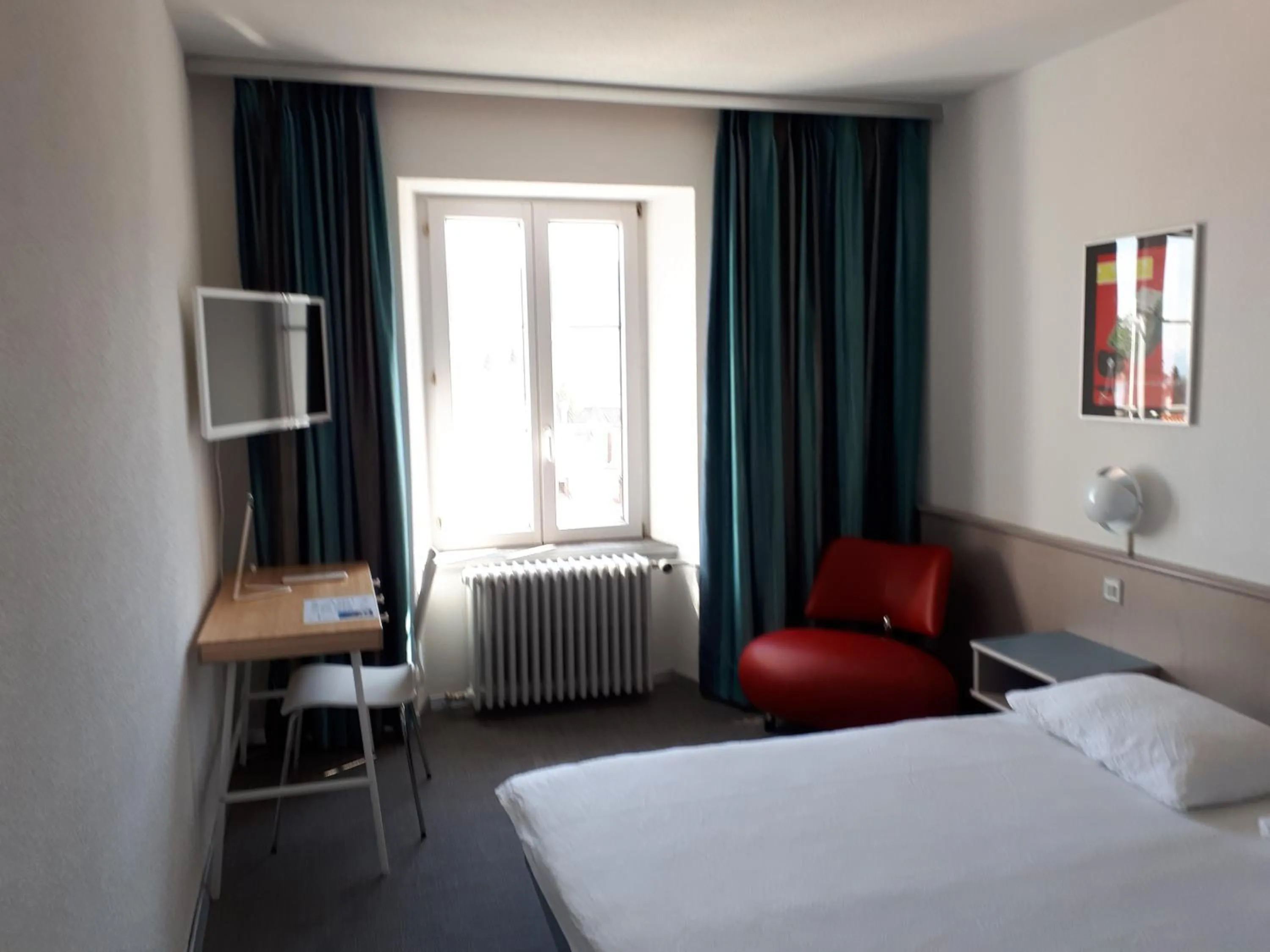 Photo of the whole room, Bed in Hôtel de France