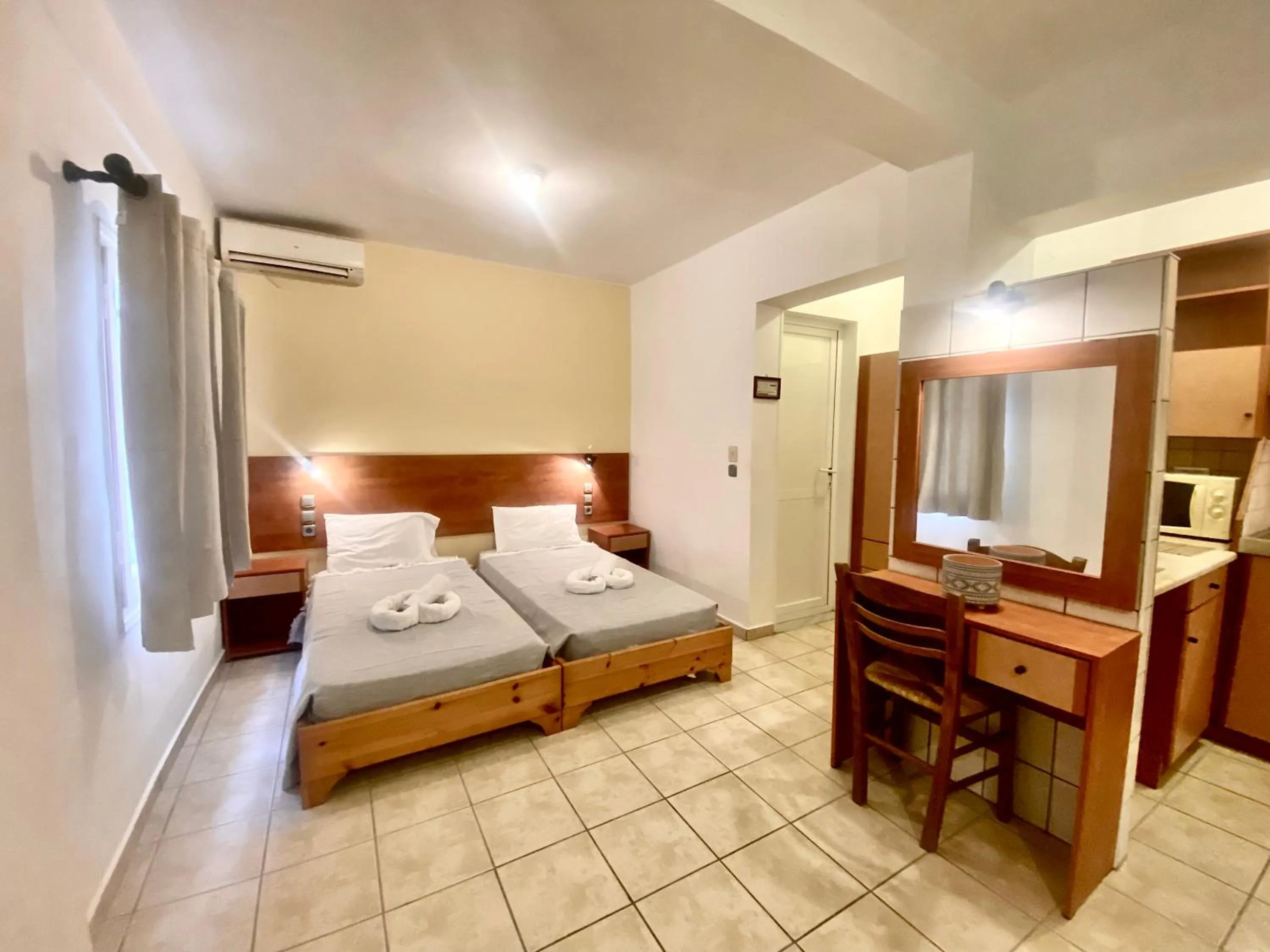 room service, Bed in Nireas Resort Corfu