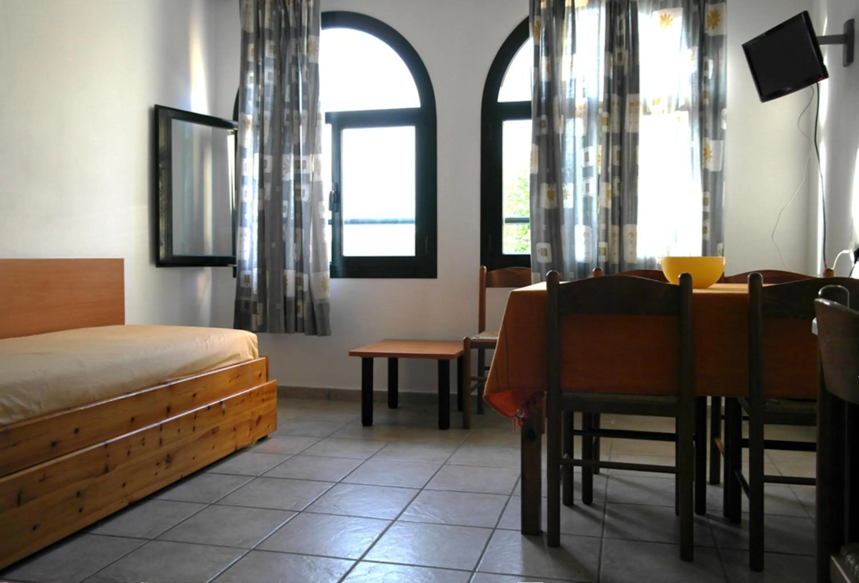 Living room, Bed in Nireas Resort Corfu