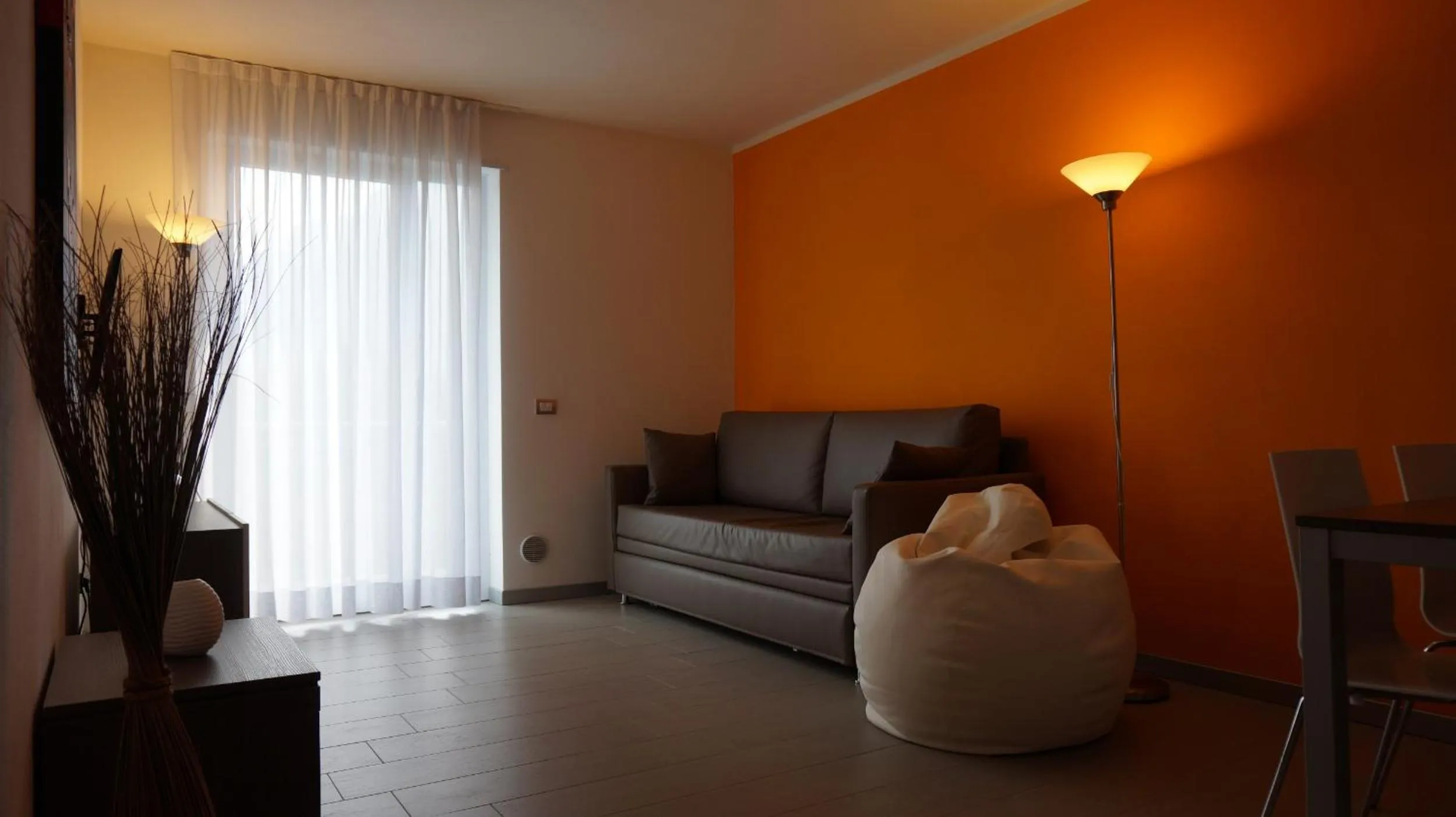 Living room in Residence Rivachiara (check-in at Hotel Riviera in Viale Rovereto, 95)