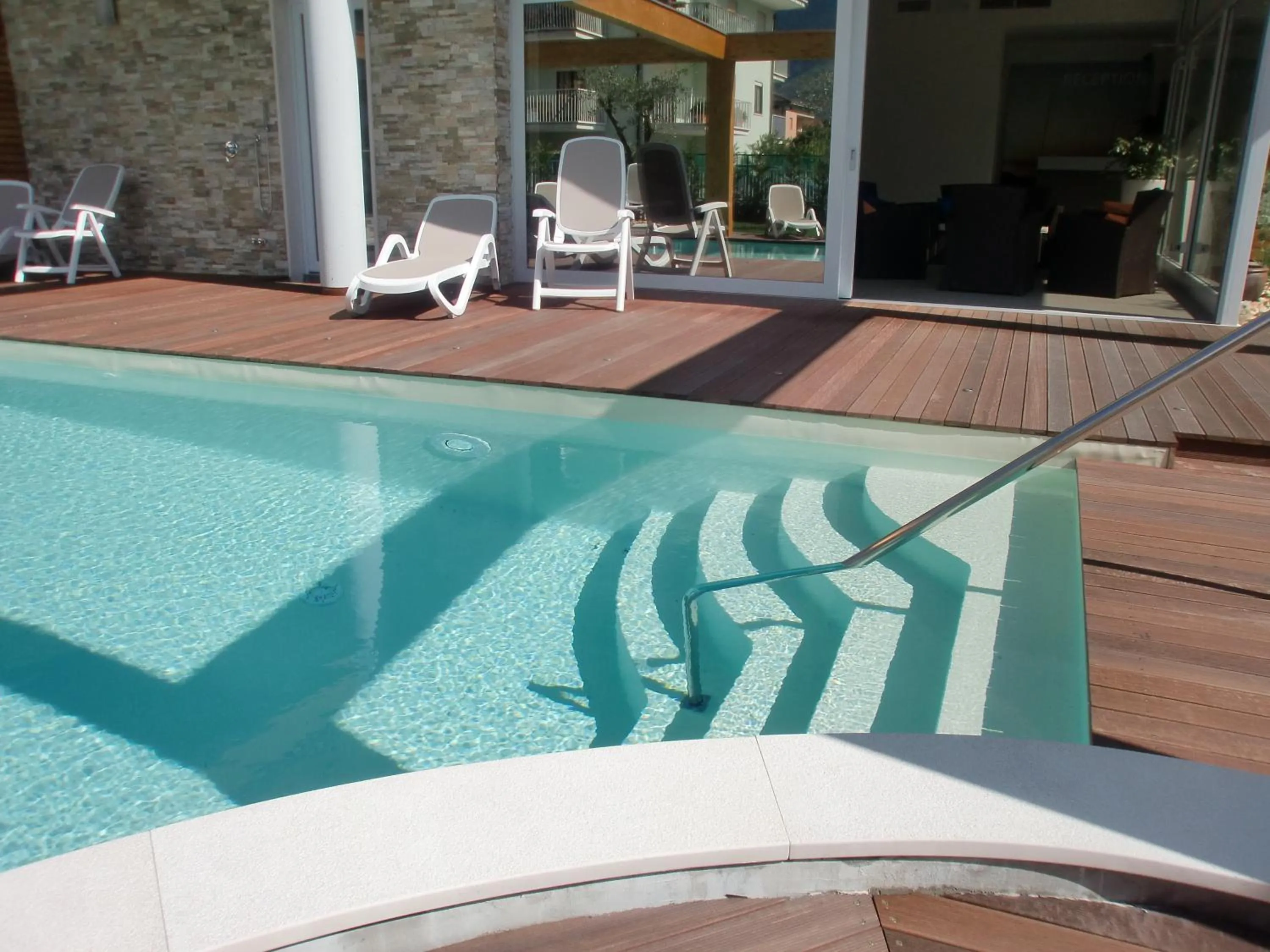 Swimming pool in Residence Rivachiara (check-in at Hotel Riviera in Viale Rovereto, 95)