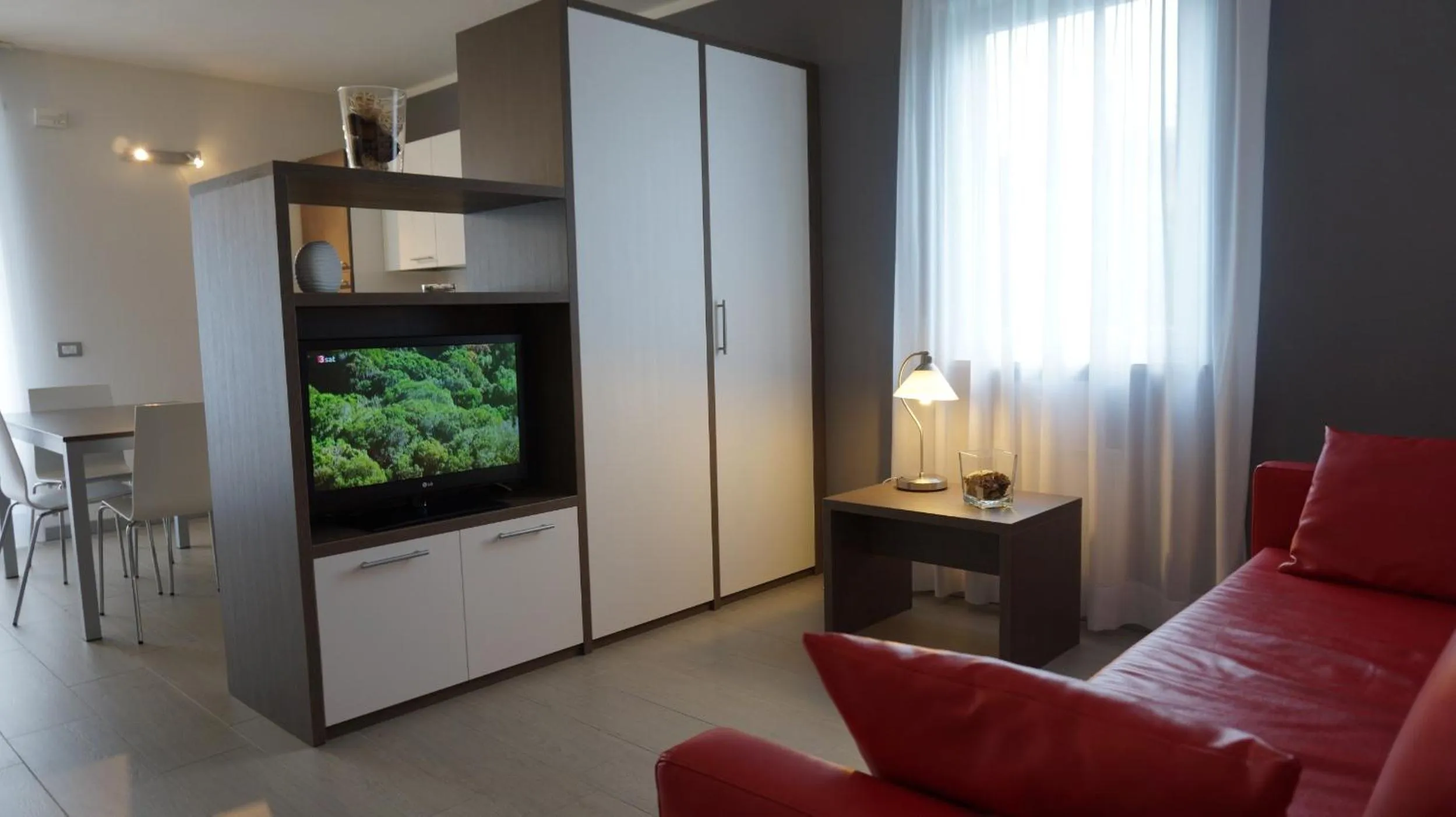 TV and multimedia in Residence Rivachiara (check-in at Hotel Riviera in Viale Rovereto, 95)