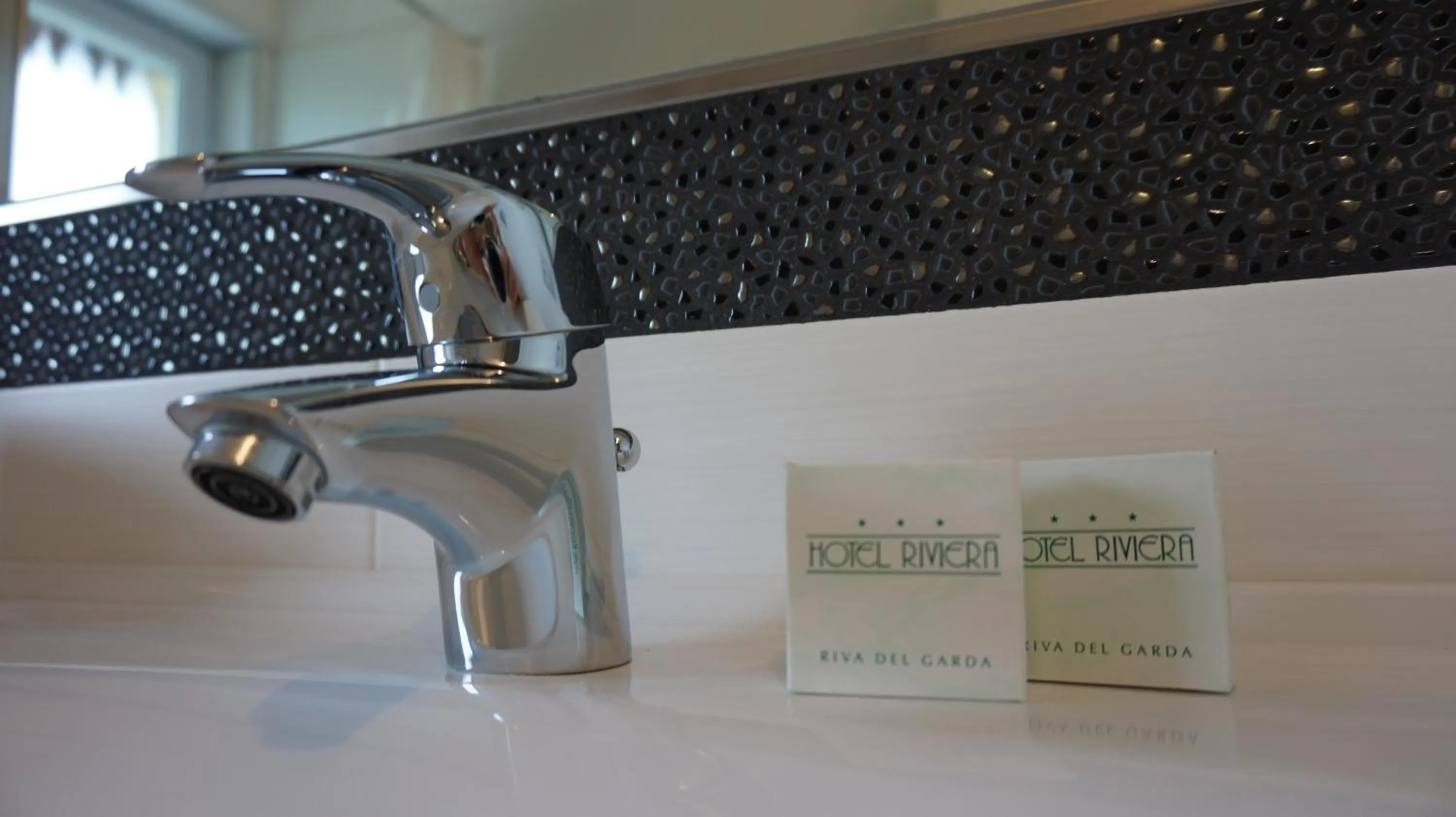 Bathroom in Residence Rivachiara (check-in at Hotel Riviera in Viale Rovereto, 95)