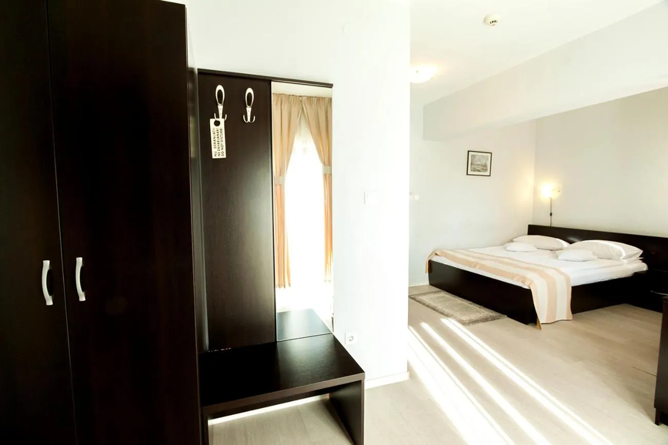 Bed in Astoria Hotel & Restaurant