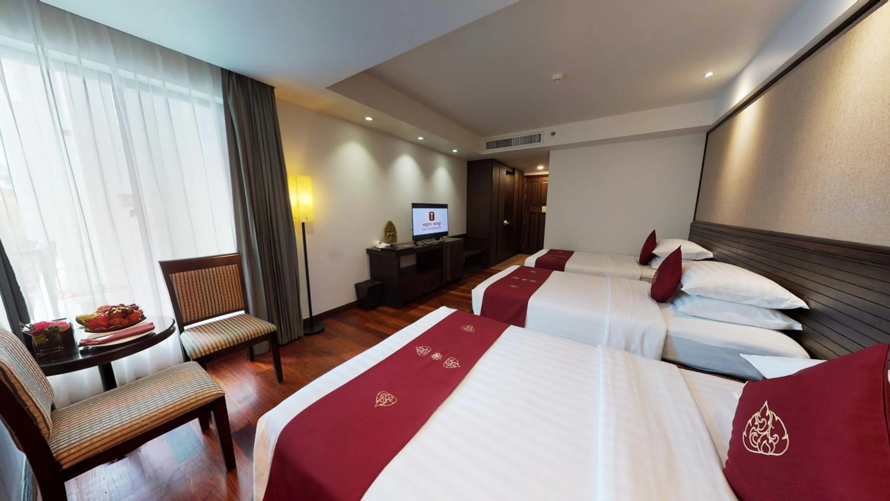 Bed in Tara Angkor Hotel