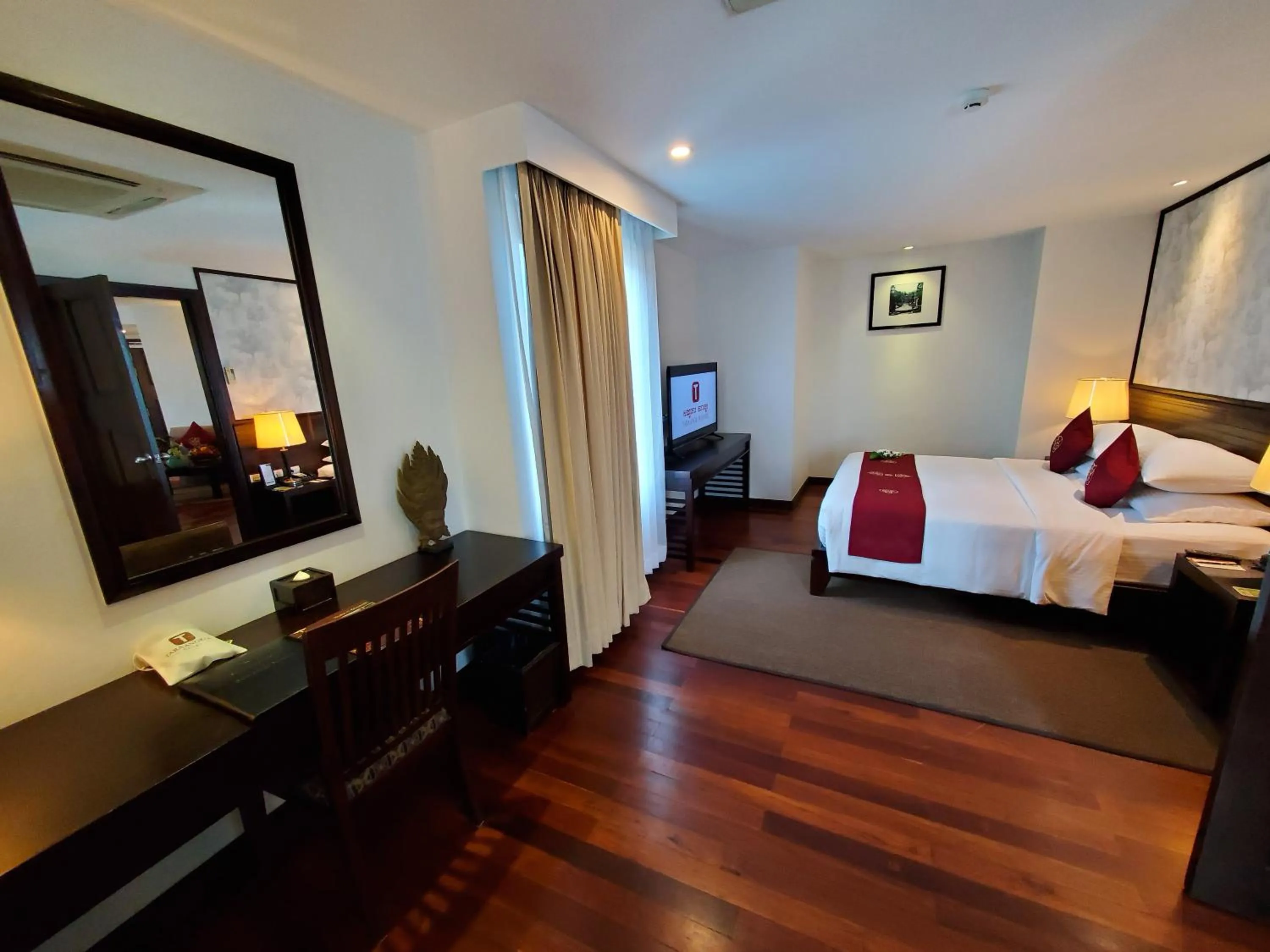 Bed in Tara Angkor Hotel