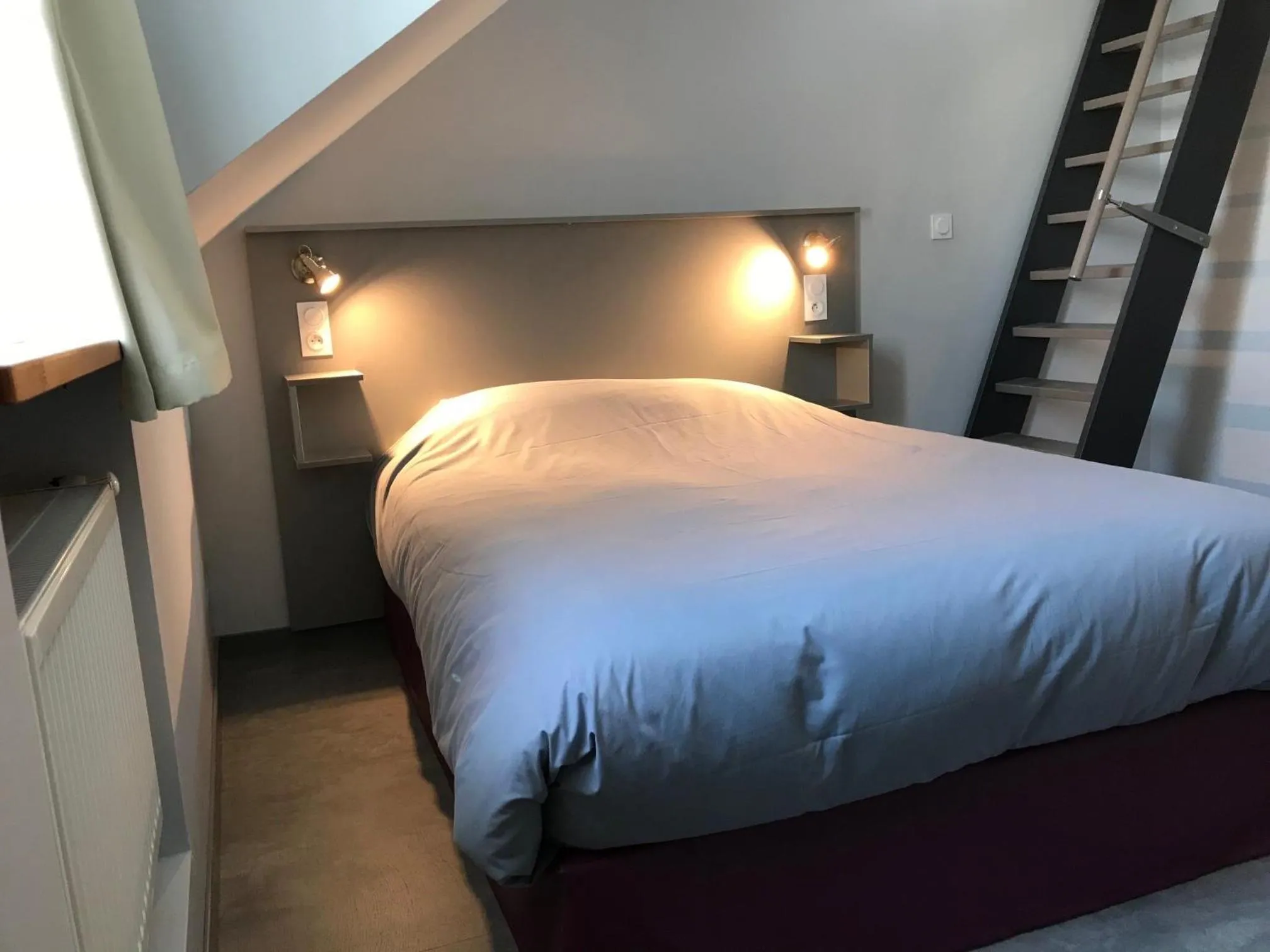 Photo of the whole room, Bed in SmartAppart Saint Nazaire