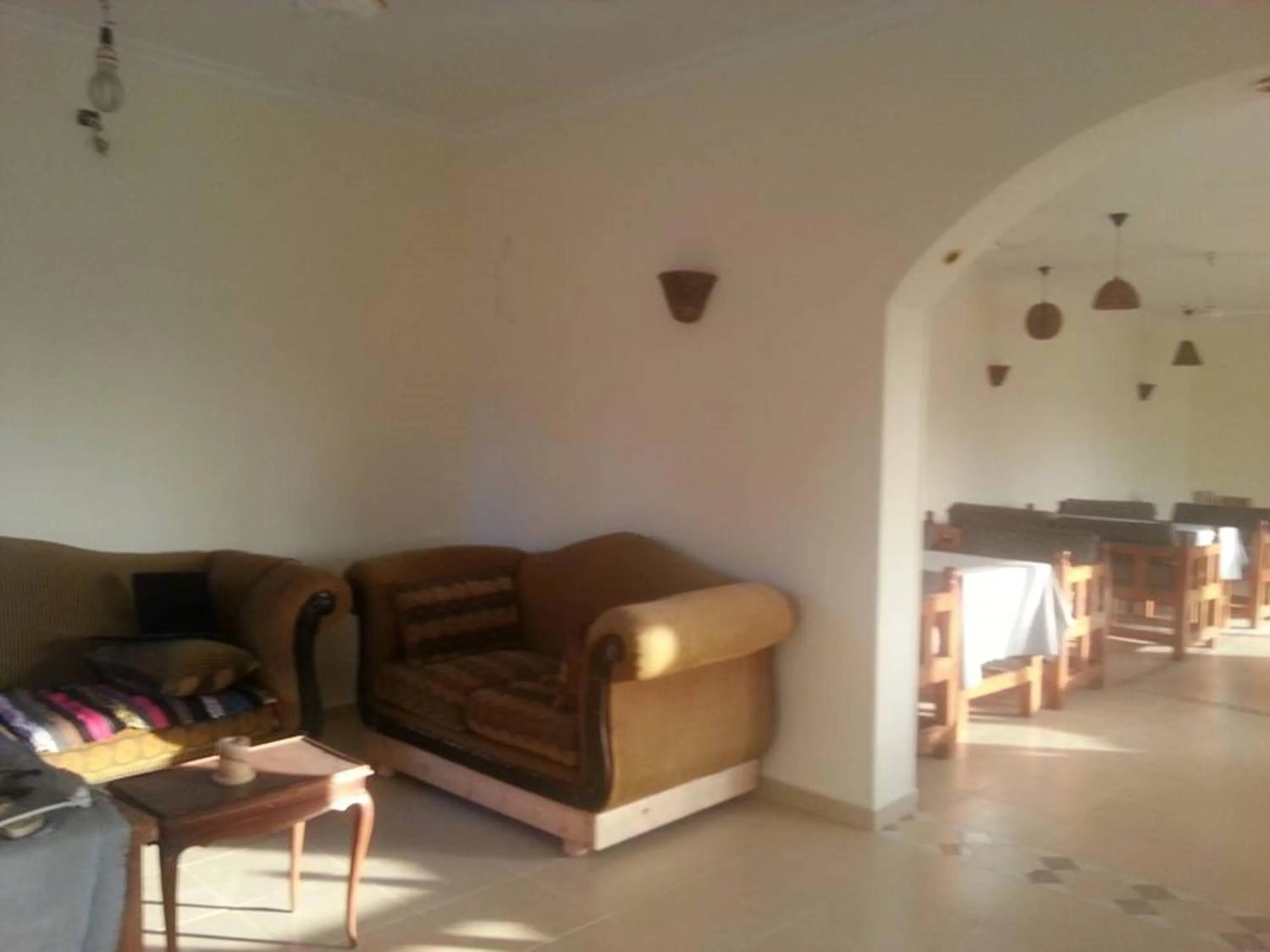 Communal lounge/ TV room in New Memnon Hotel