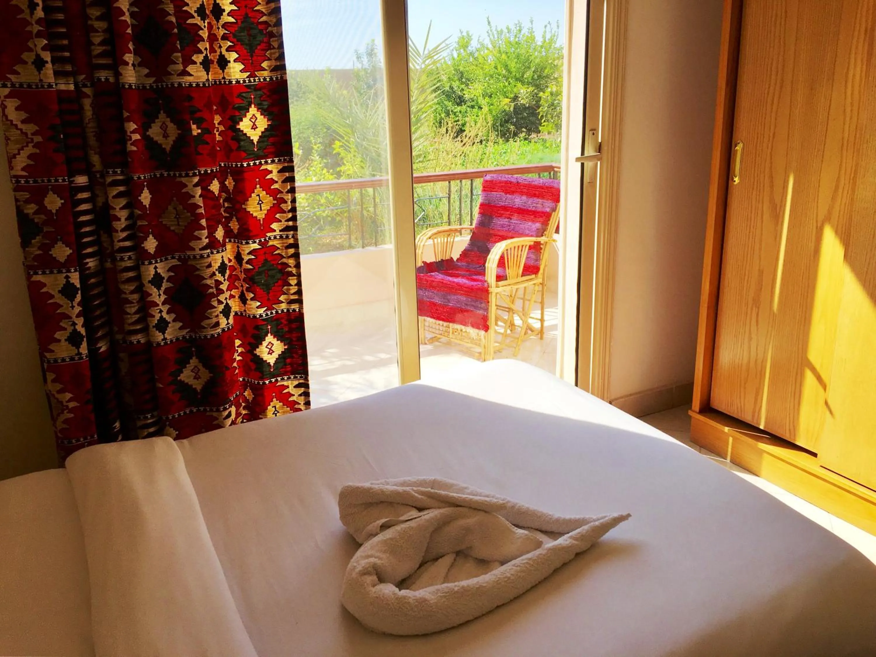 Bed in New Memnon Hotel