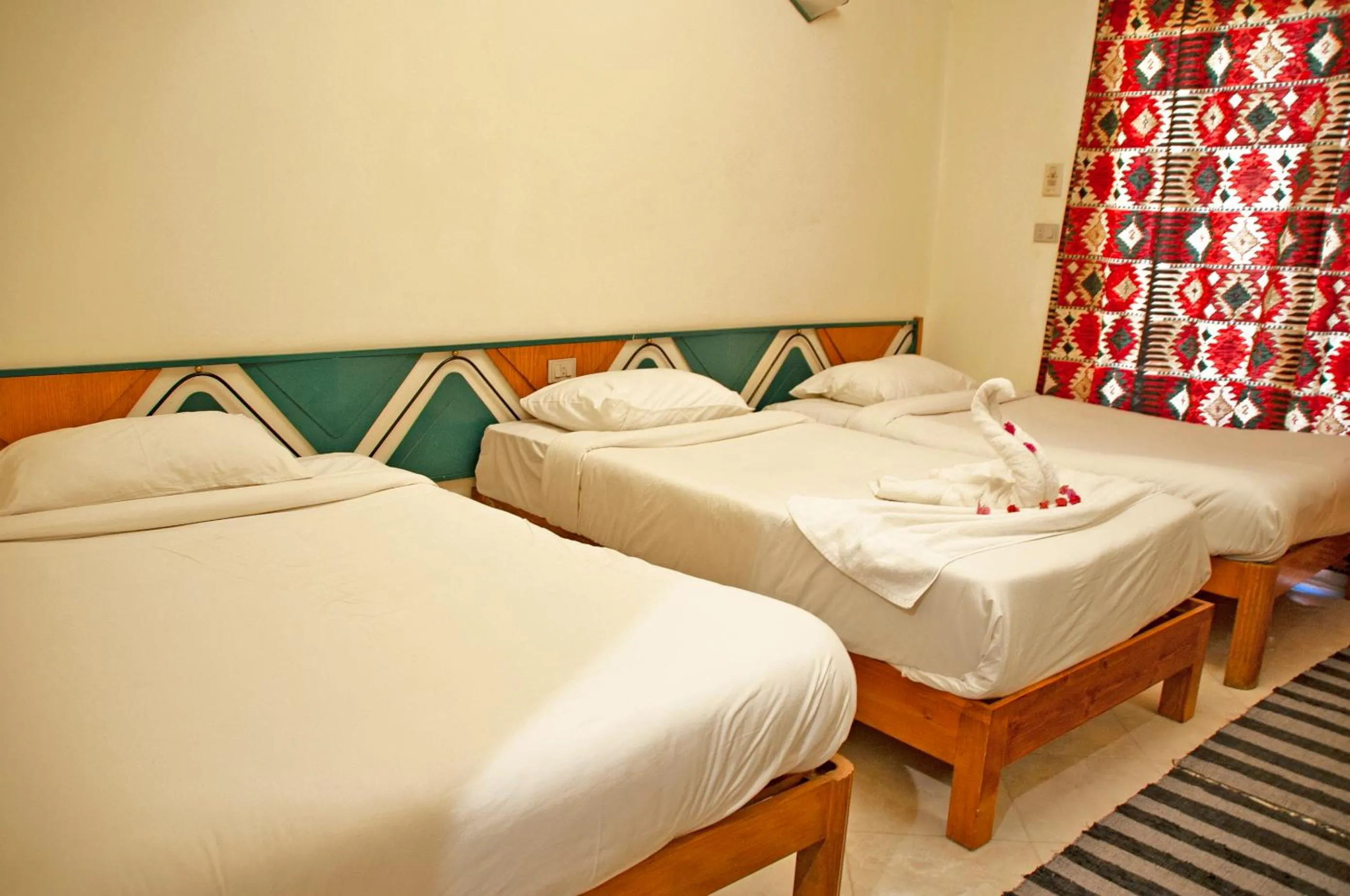 Bed in New Memnon Hotel