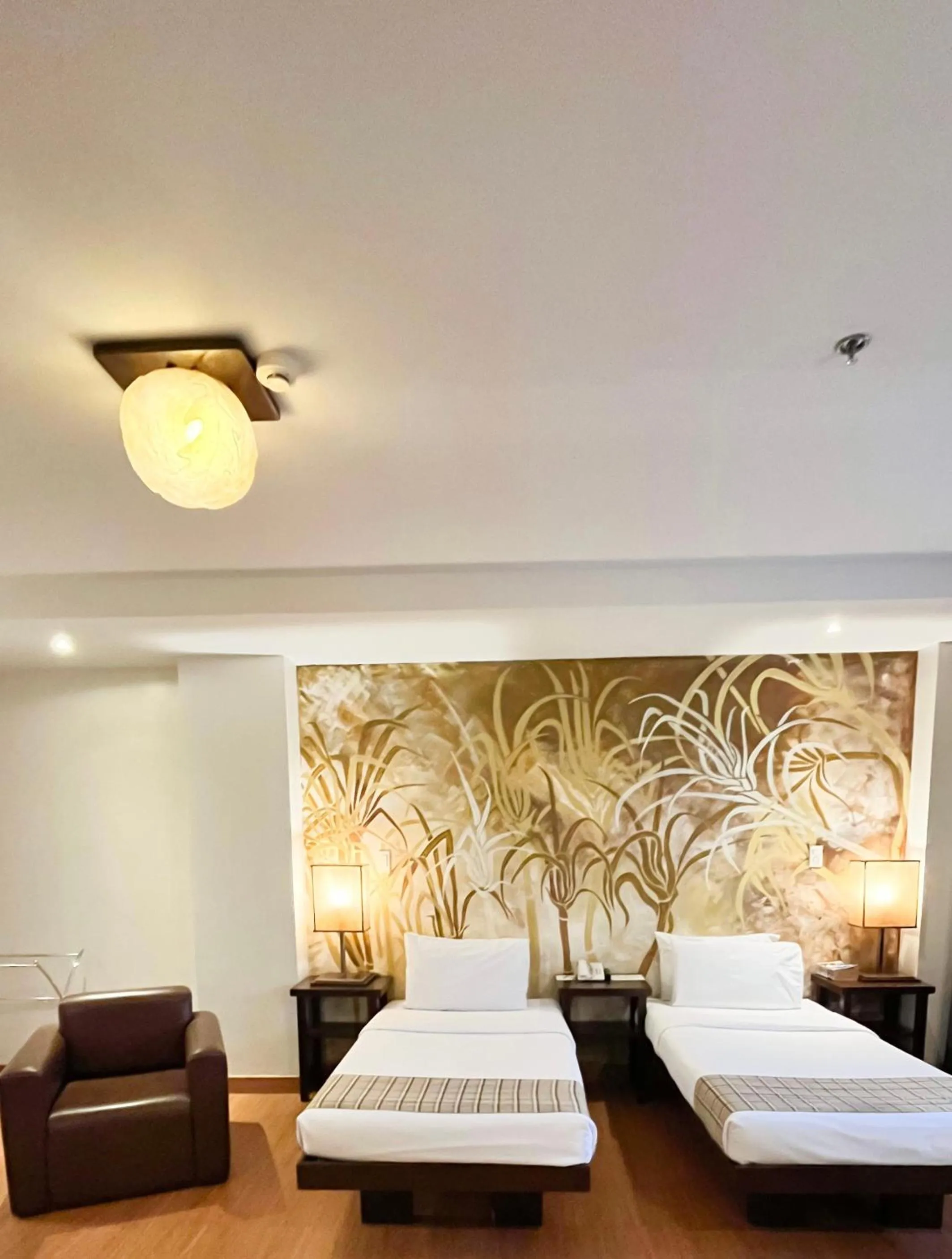 Bed in Nature's Village Resort