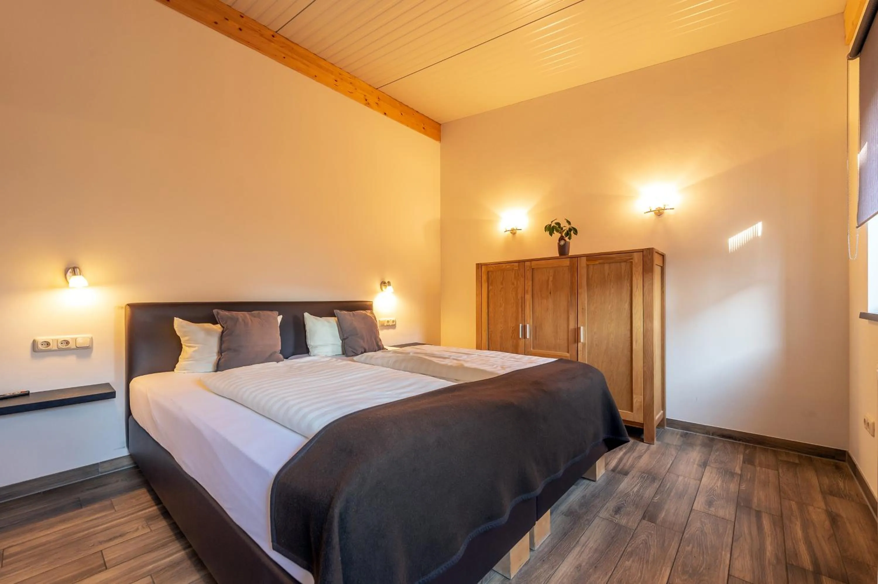 Bed in Kaiser´s Weinland Hotel