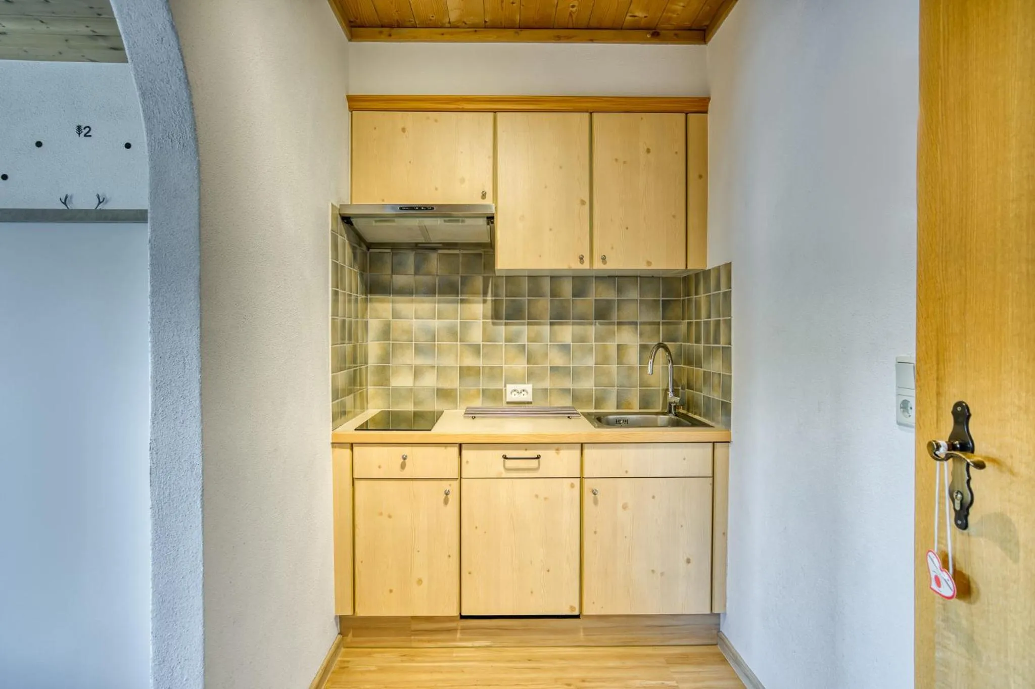 Kitchen or kitchenette in Boutiquehotel ZOMM in Seefeld