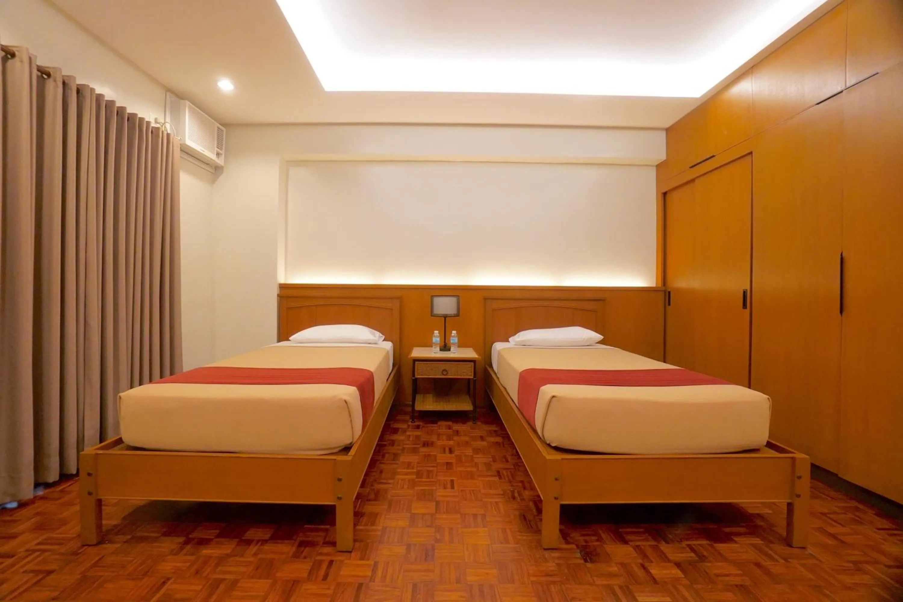 Bed in Tropicana Suites