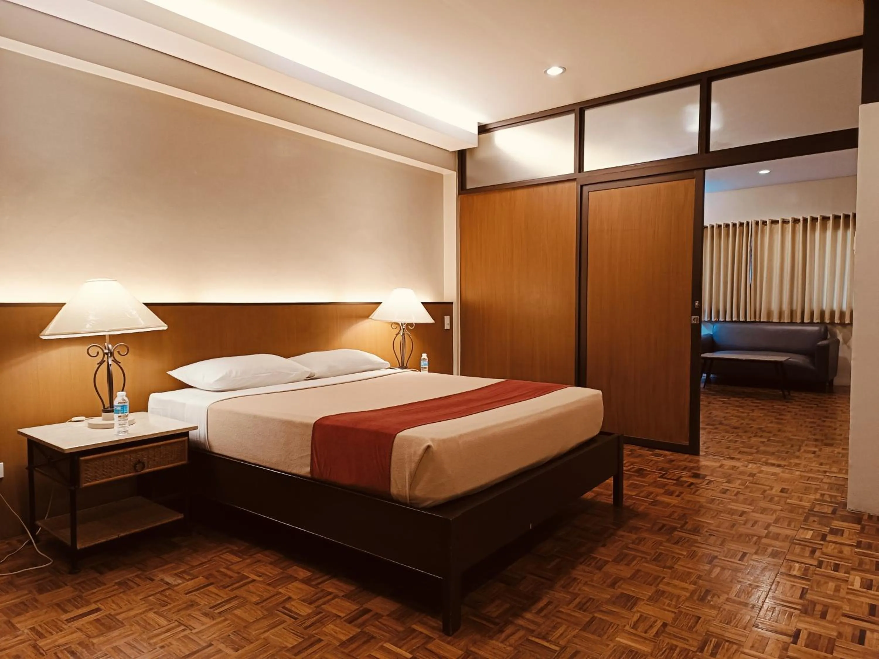 Bed in Tropicana Suites