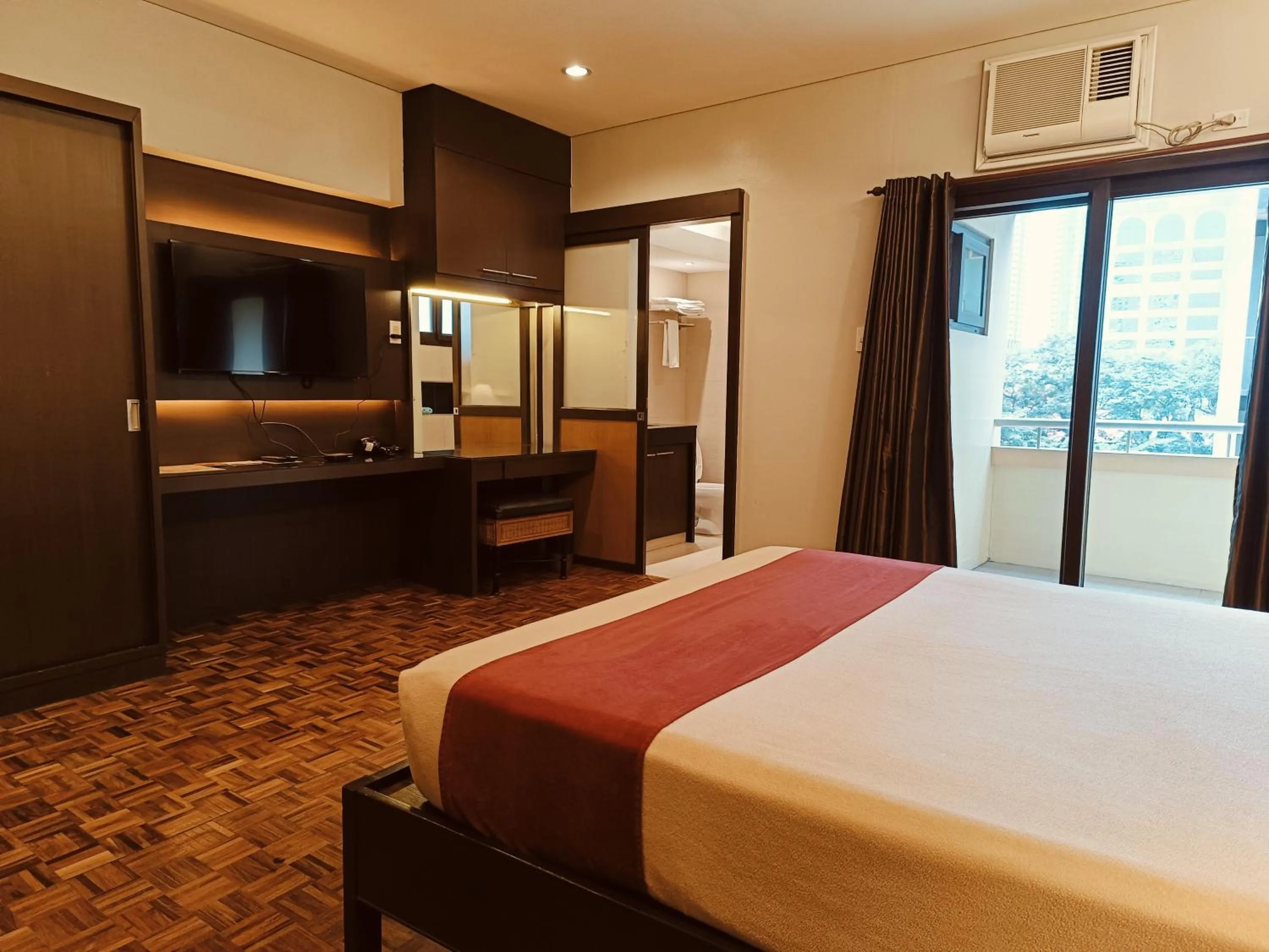 Bed in Tropicana Suites