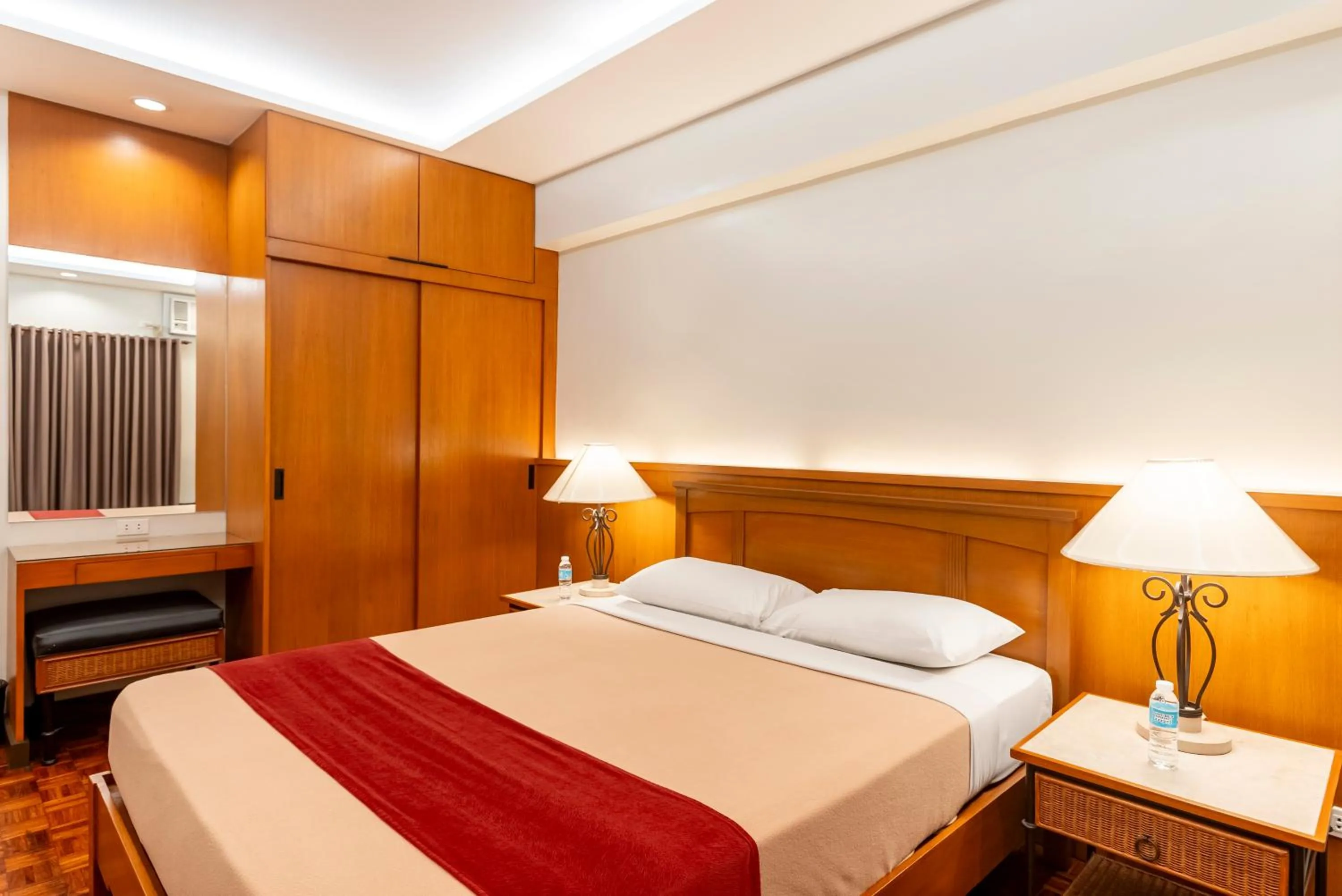 Bed in Tropicana Suites