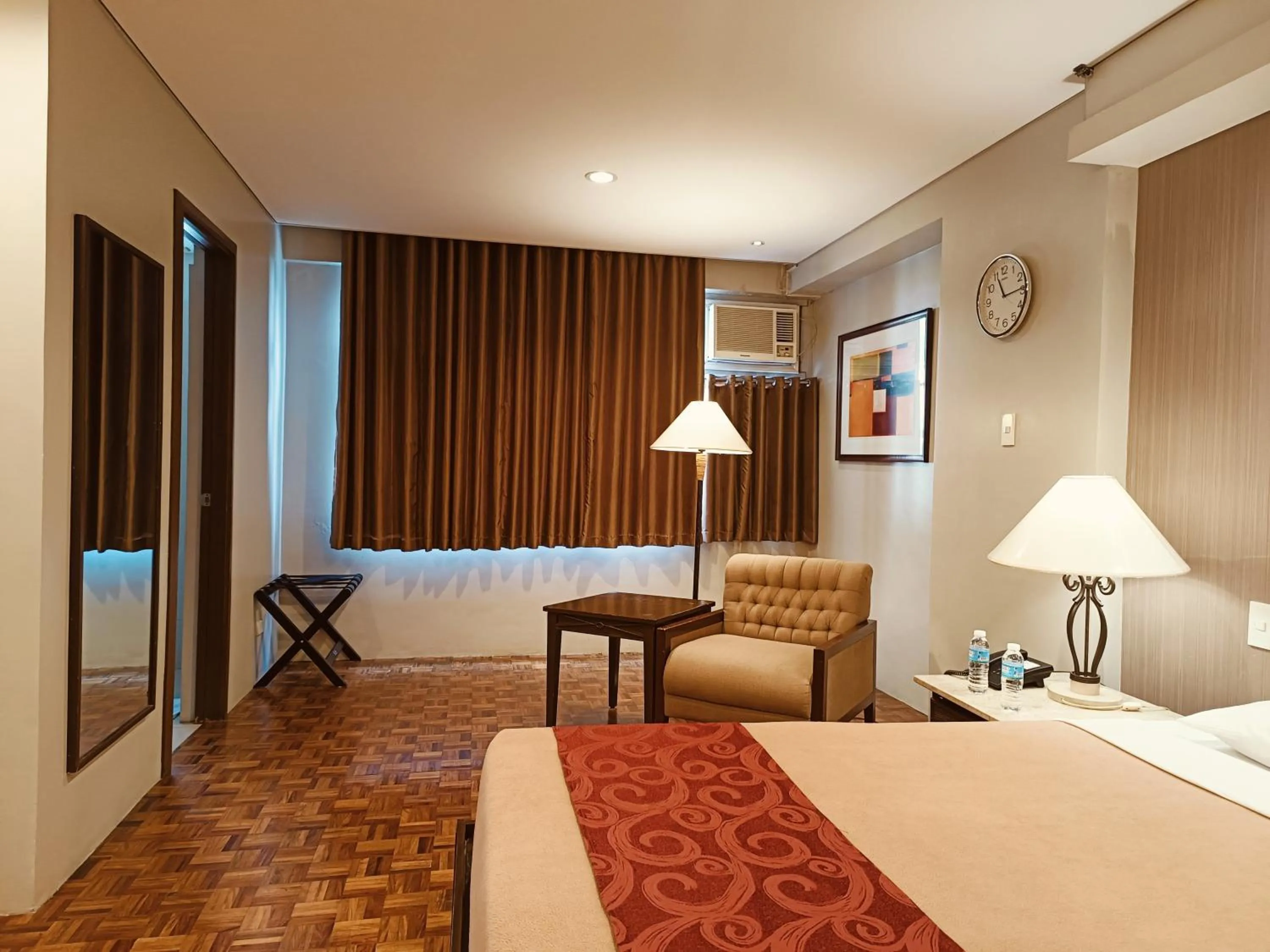 Bed in Tropicana Suites