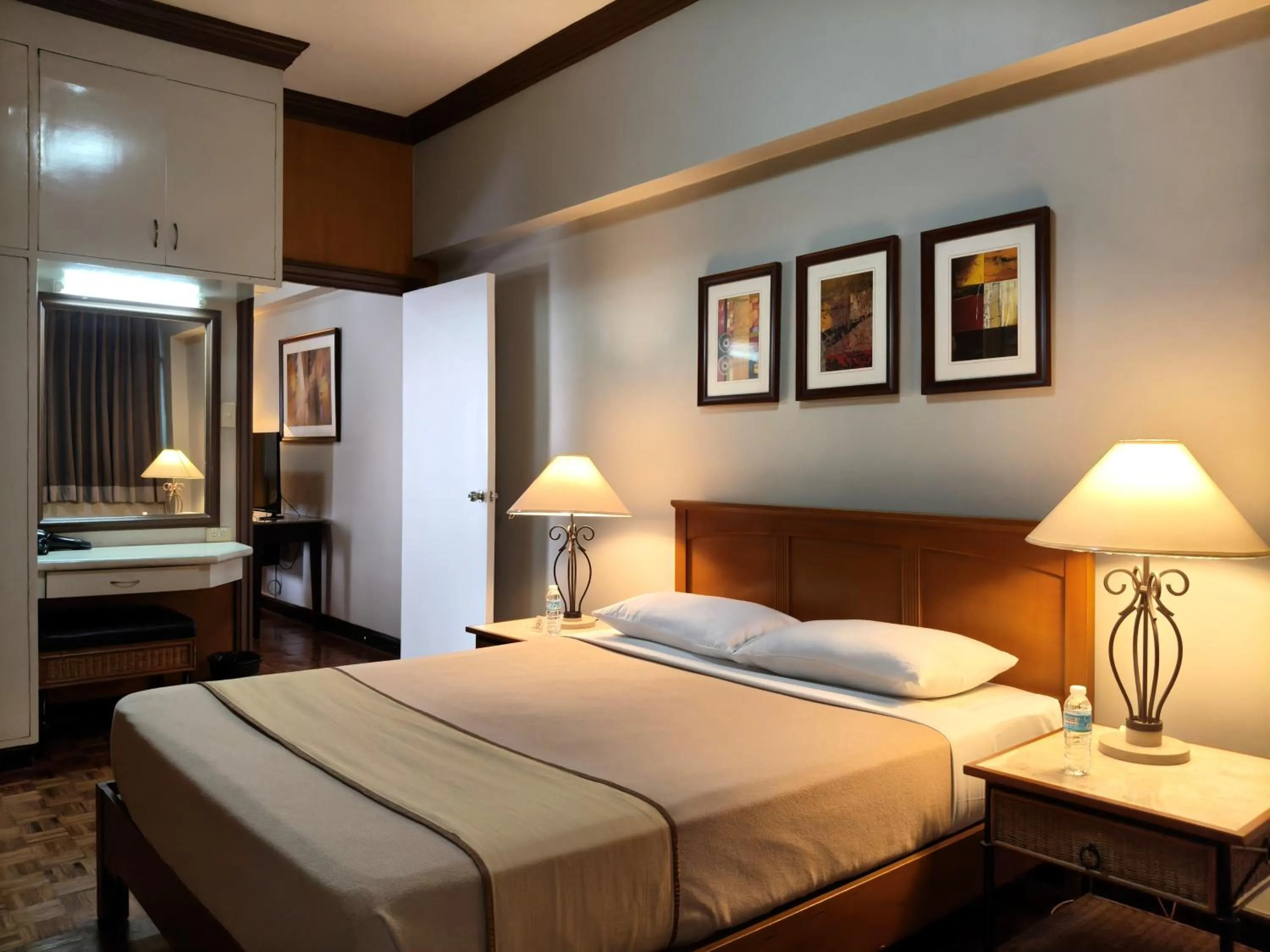 Bed in Tropicana Suites