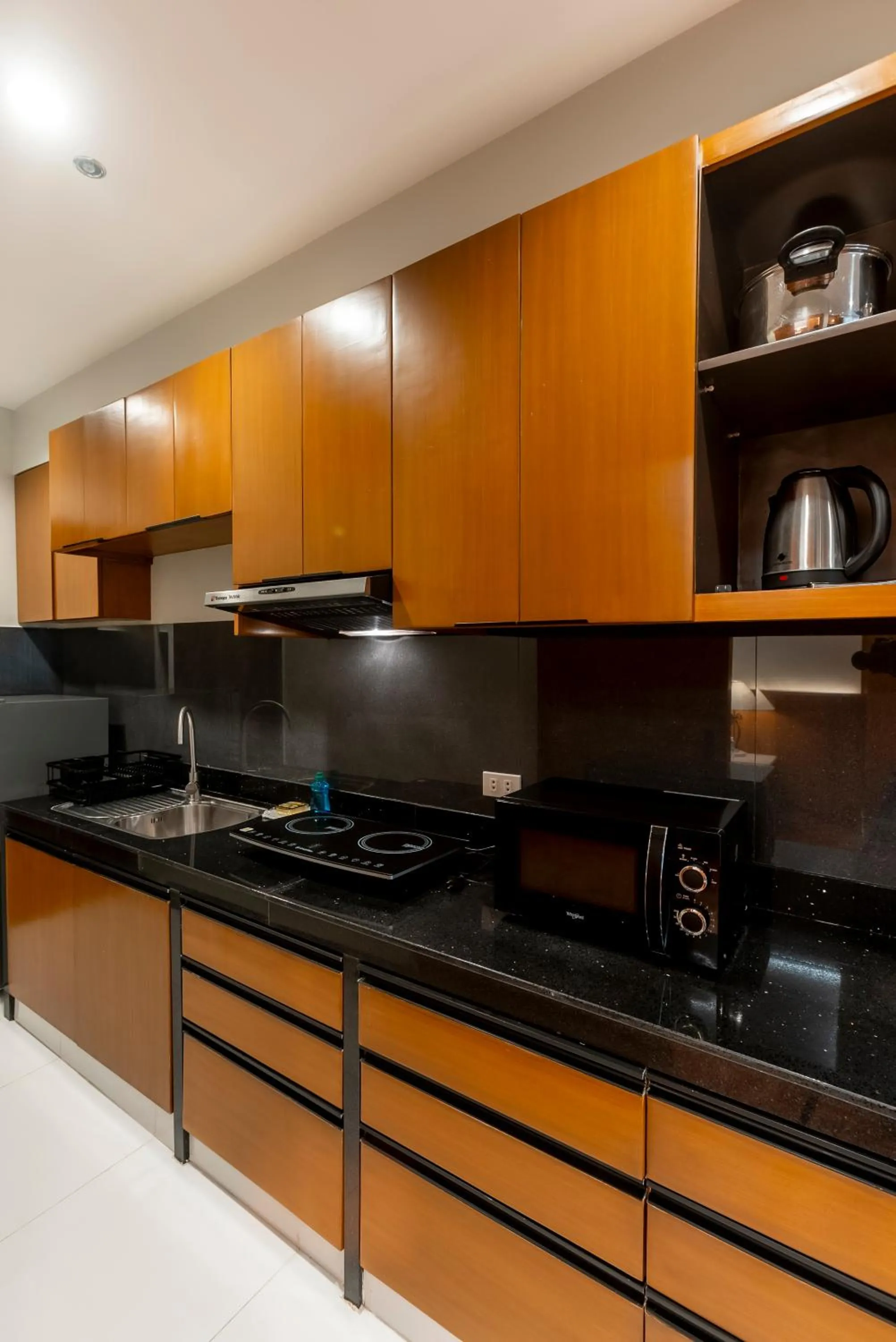 Kitchen or kitchenette in Tropicana Suites