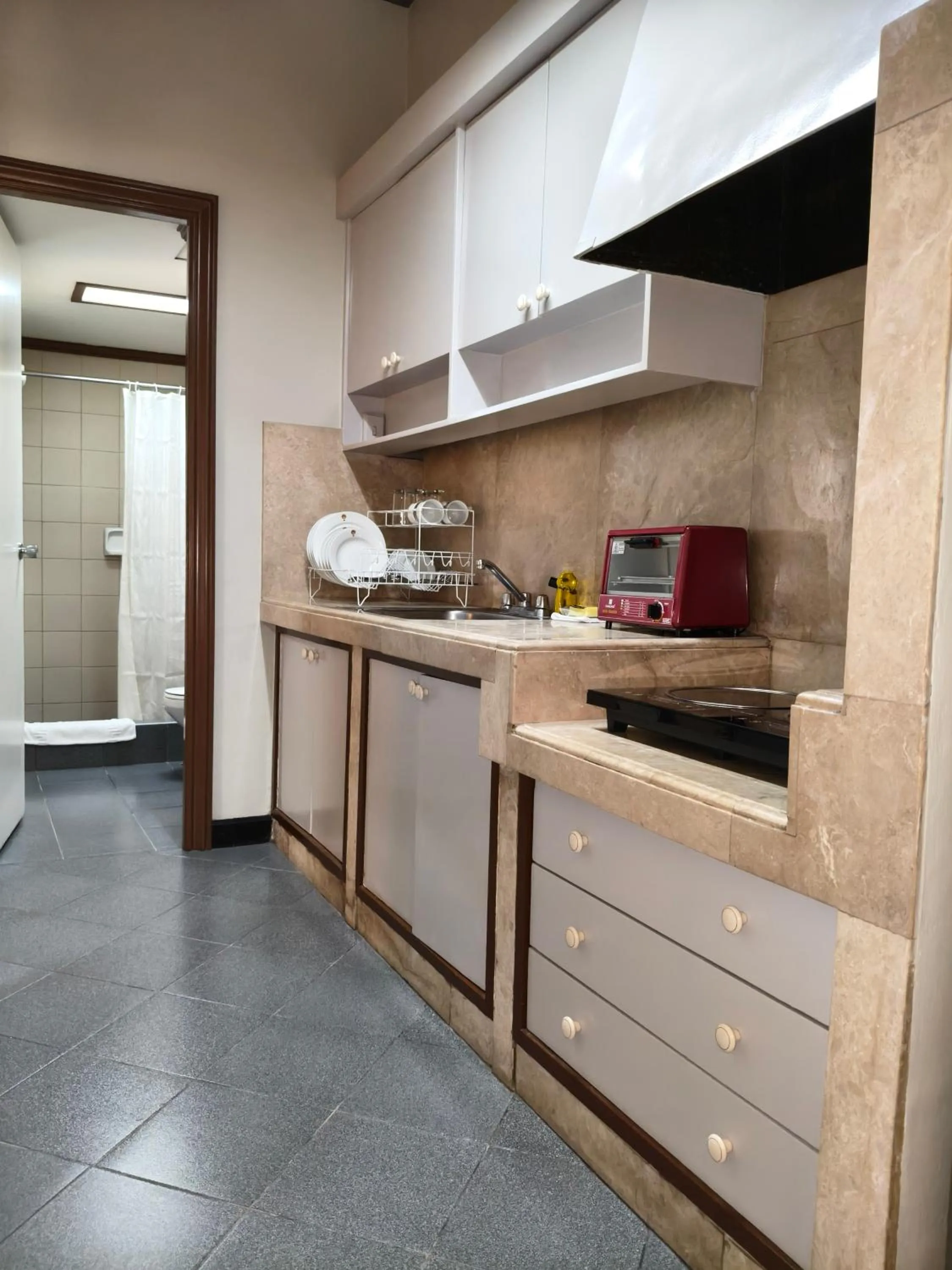 Kitchen or kitchenette in Tropicana Suites