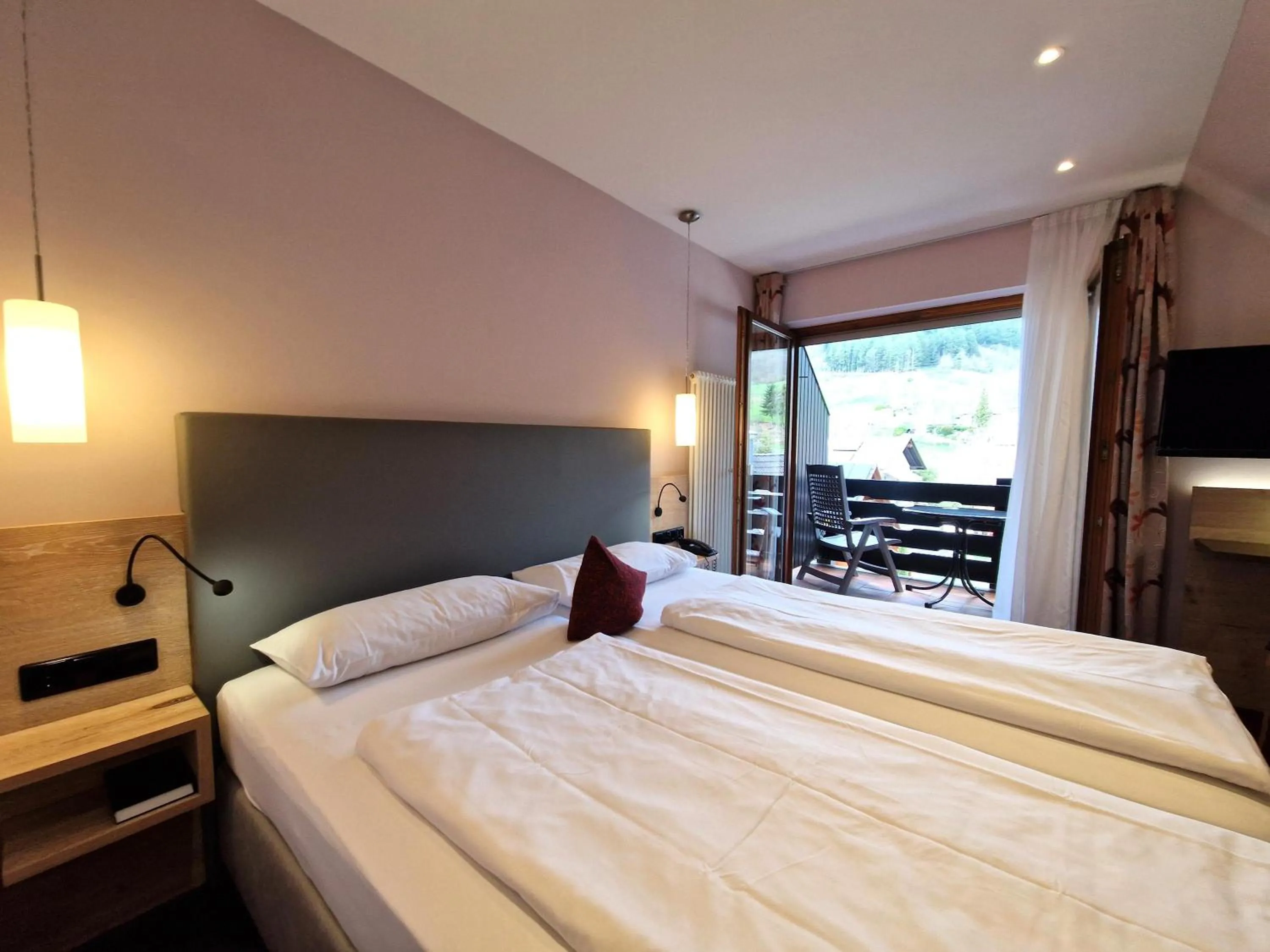 Bed in Mosers Blume Relax & Genuss Hotel