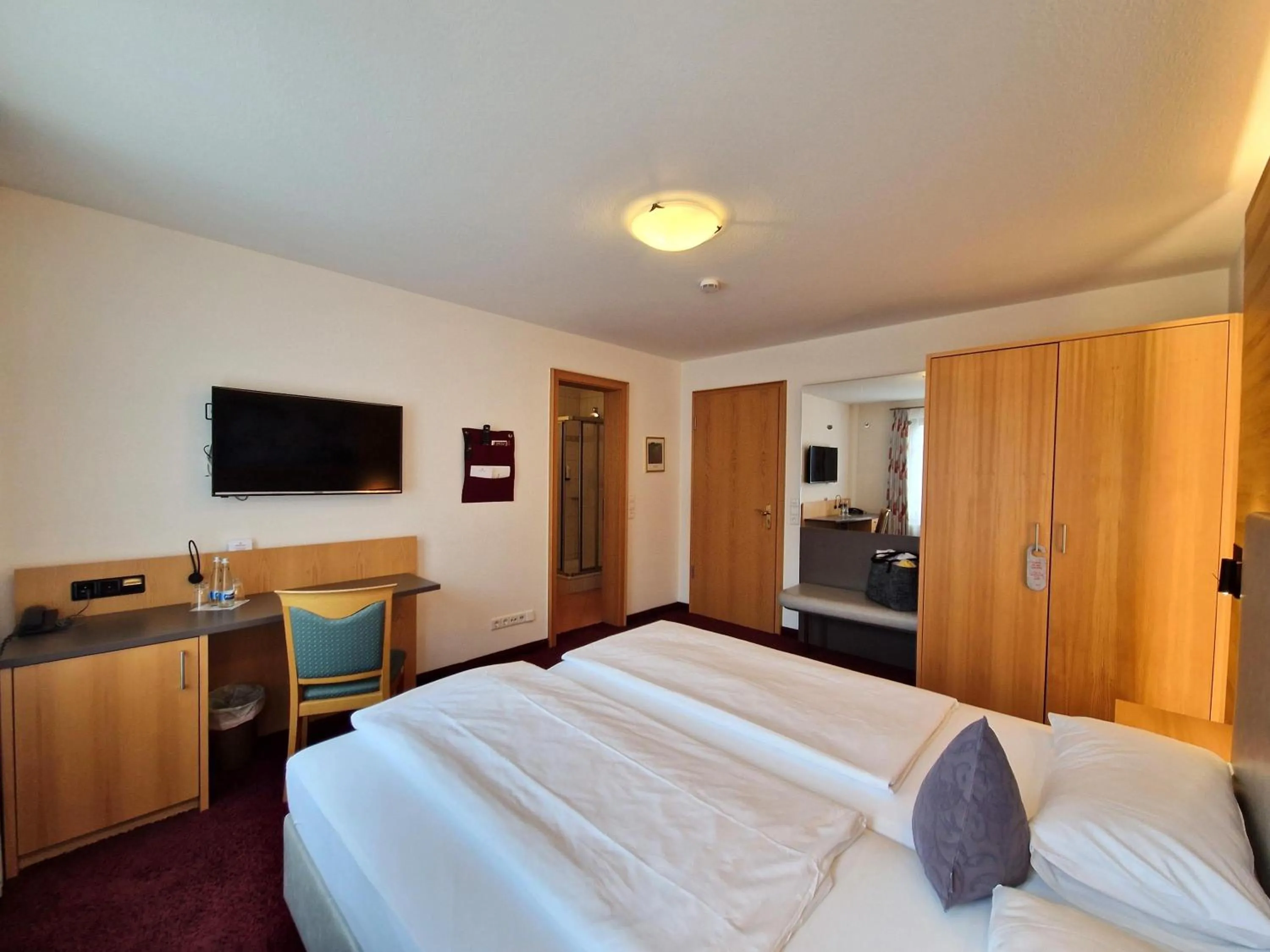 Bed in Mosers Blume Relax & Genuss Hotel