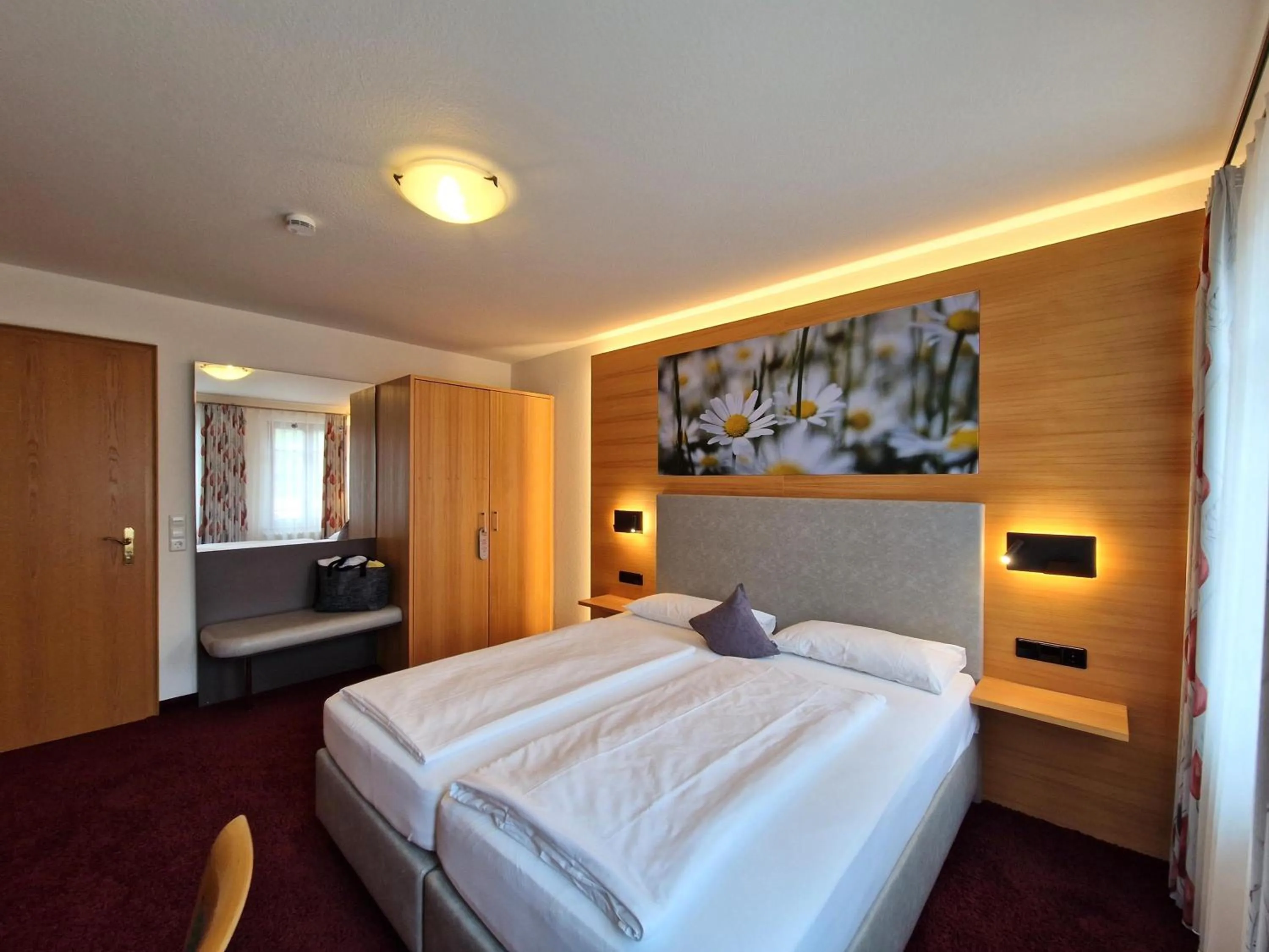 Bed in Mosers Blume Relax & Genuss Hotel