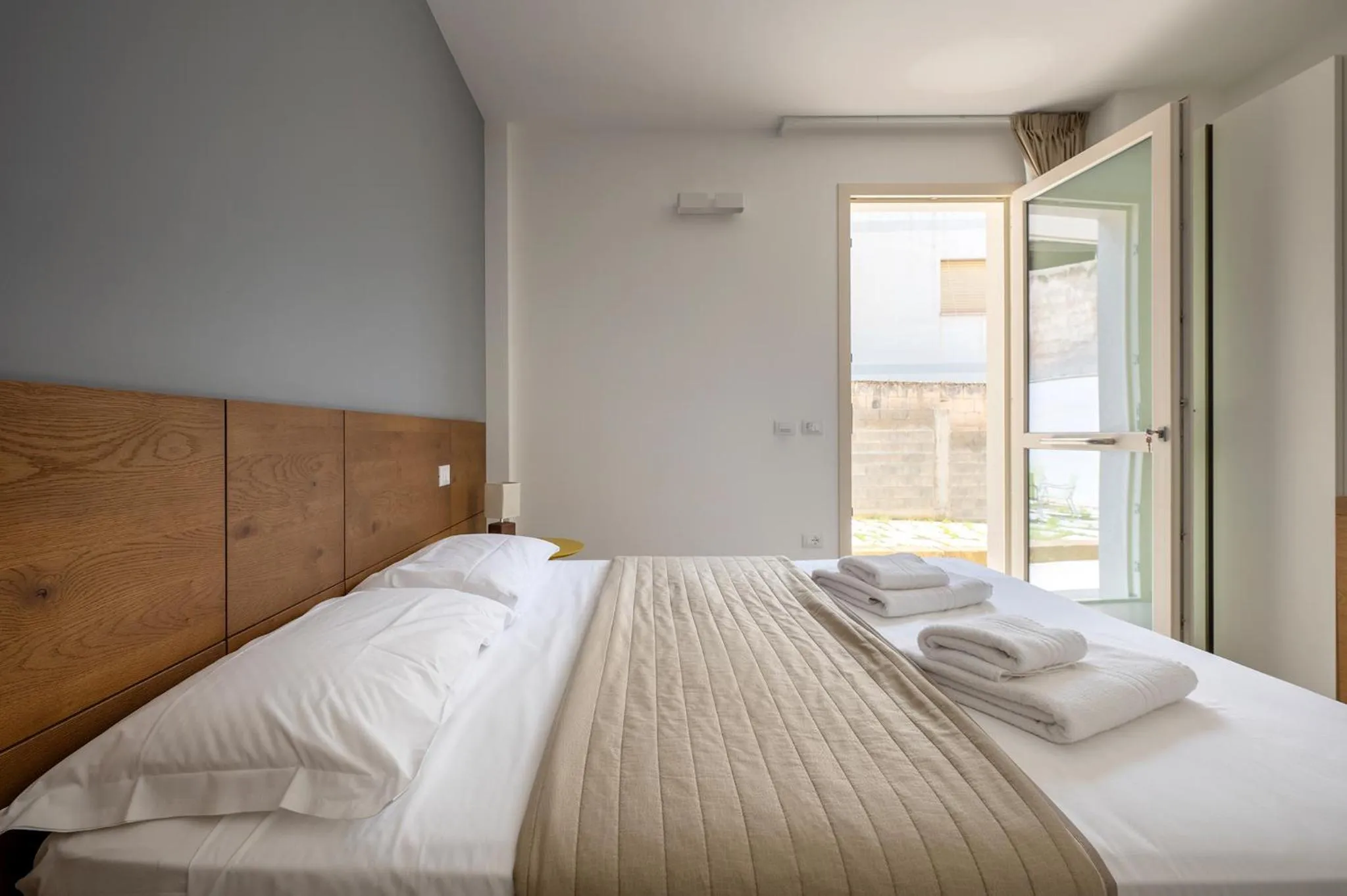 Bed in Serafini Rooms