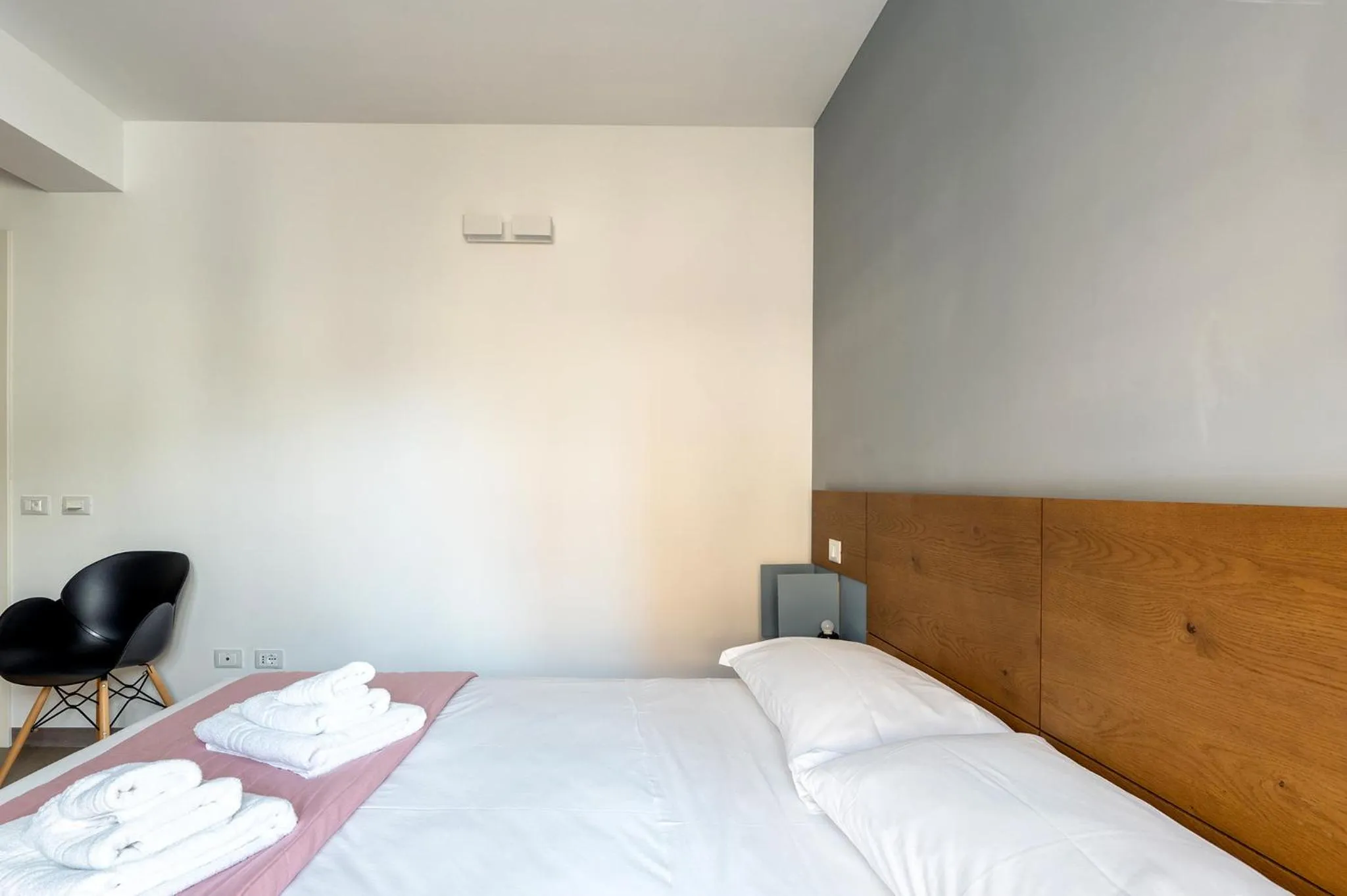 Bed in Serafini Rooms