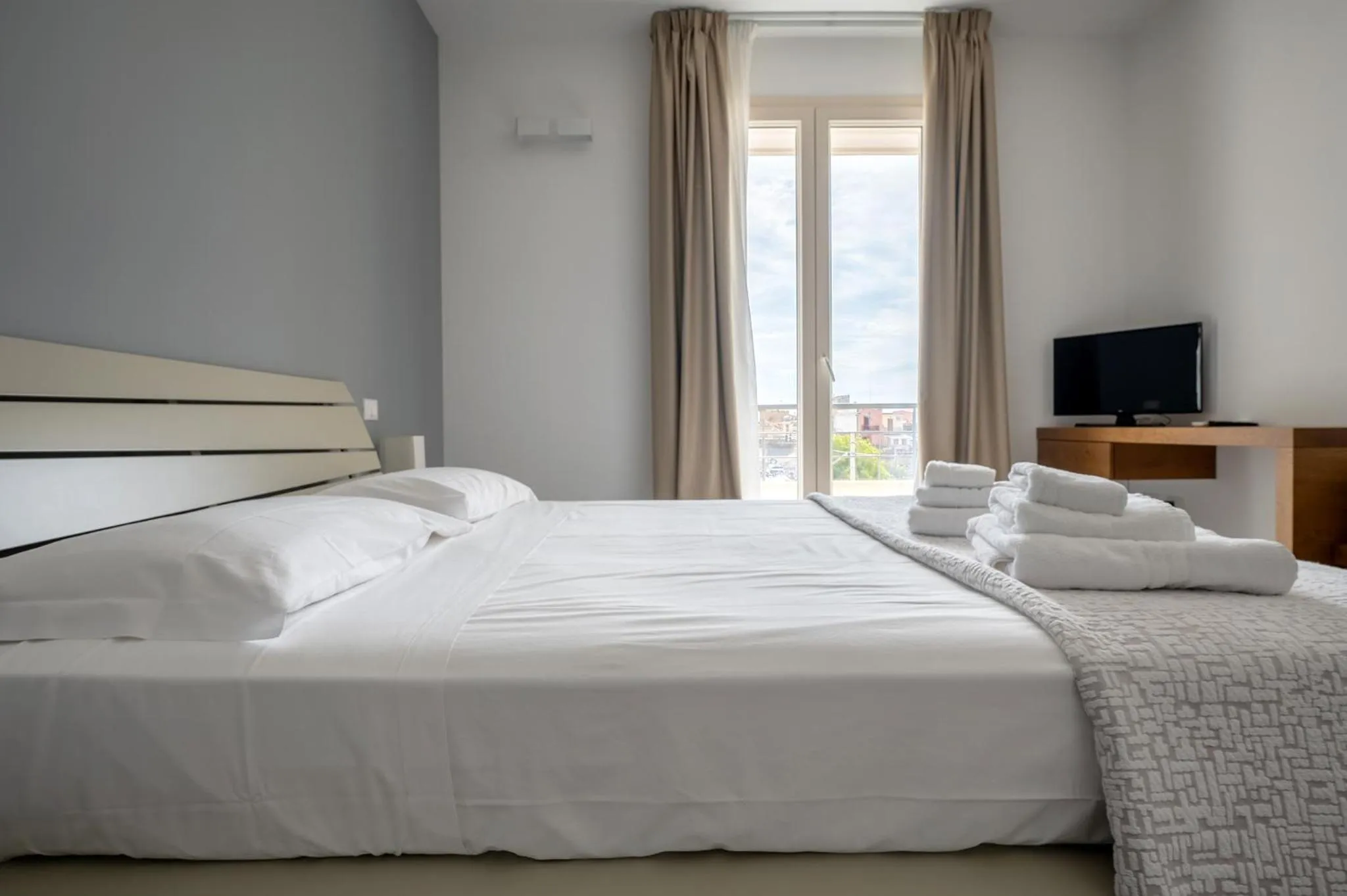 Bed in Serafini Rooms