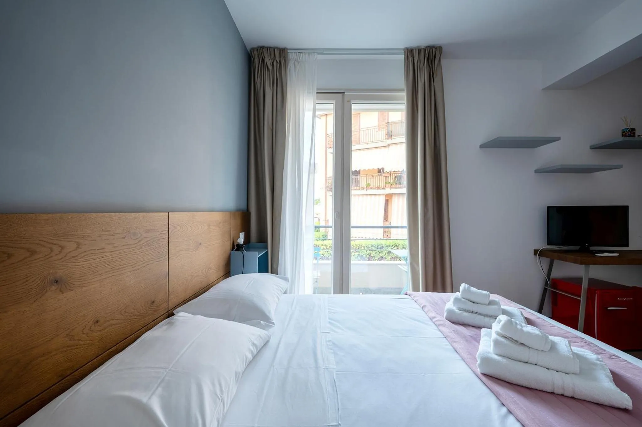 Bed in Serafini Rooms